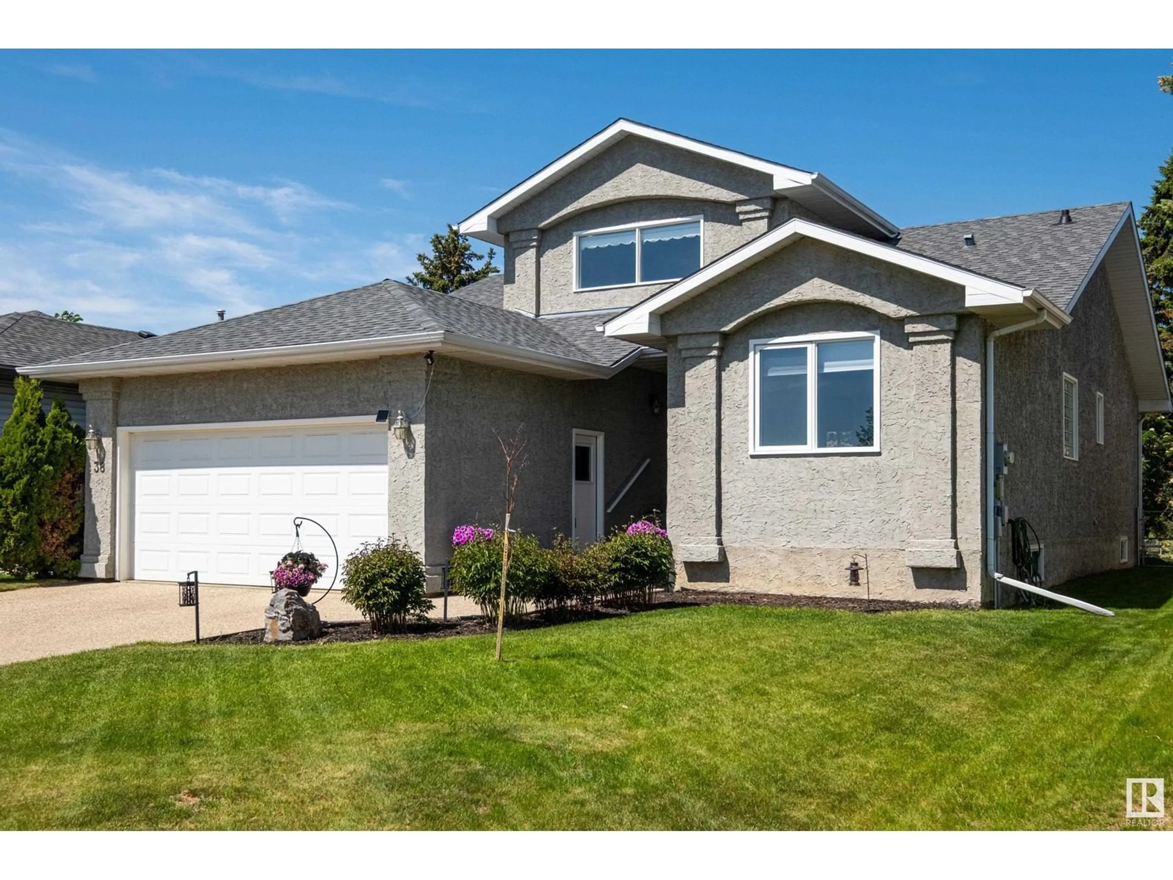Home with vinyl exterior material, street for 38 FAIRWAY DR, Spruce Grove Alberta T7X2K3