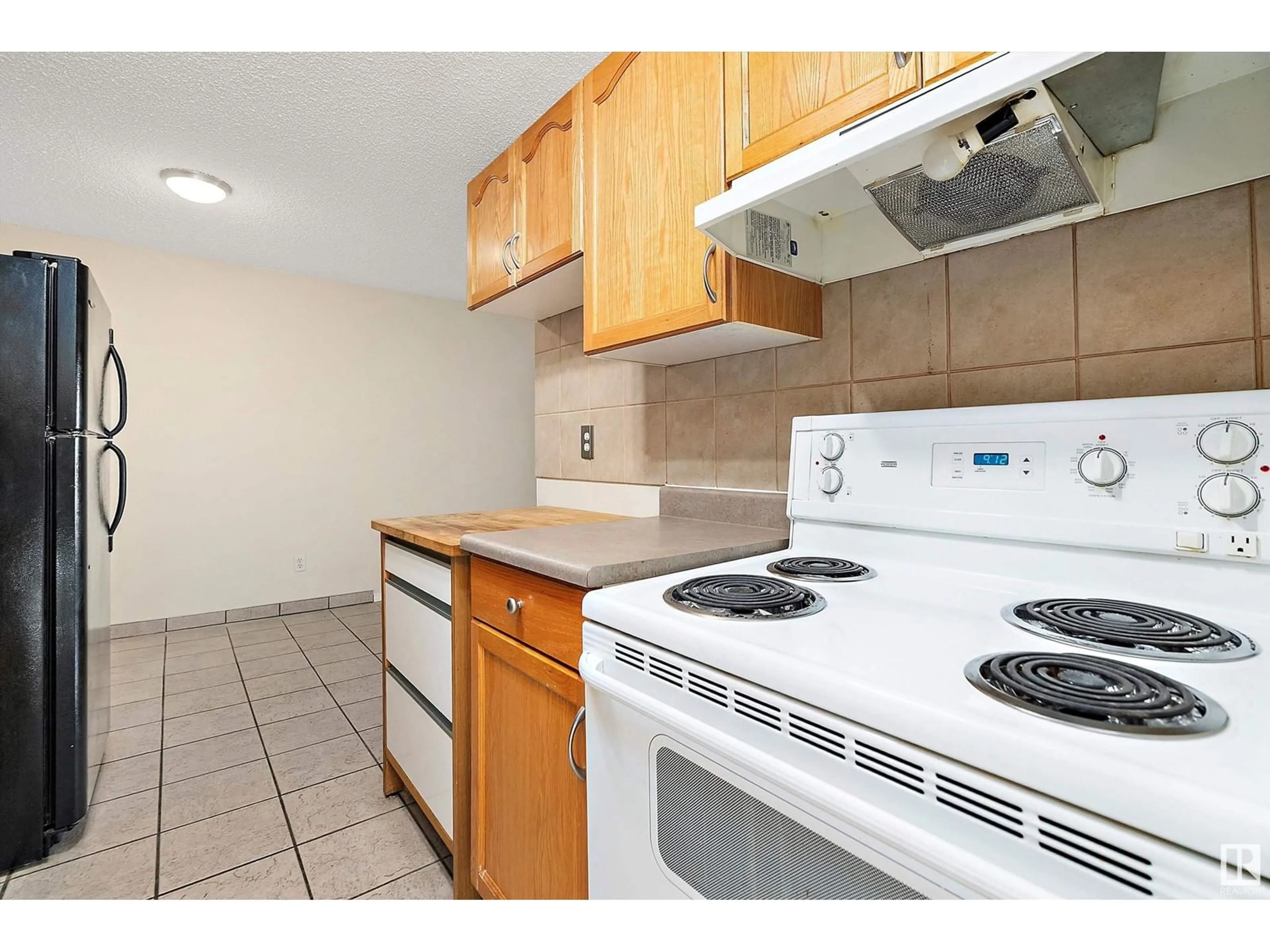 Standard kitchen, unknown for #107 - 2545 116 ST, Edmonton Alberta T6J3Z7