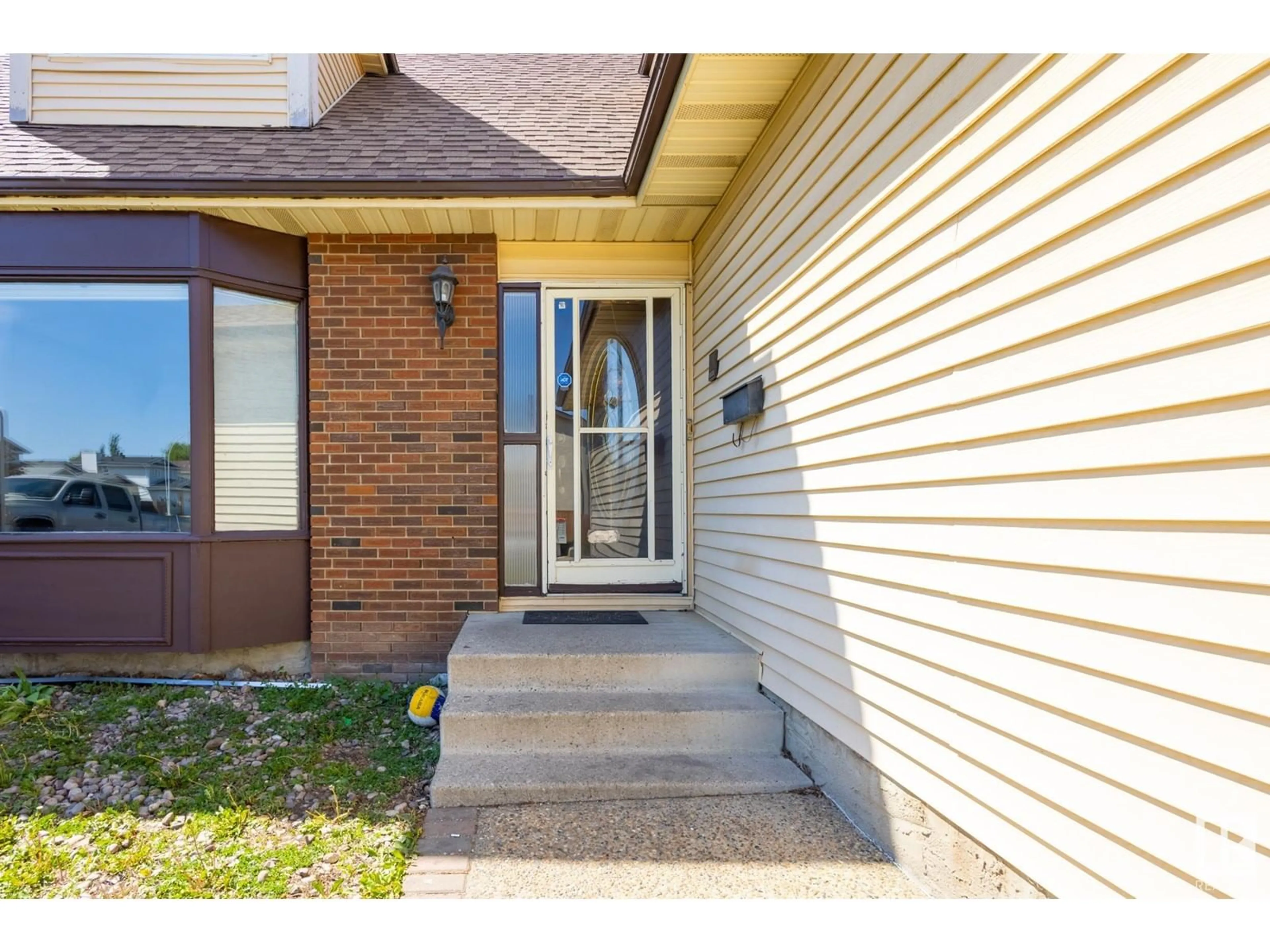 Home with brick exterior material, street for 18012 96 ST, Edmonton Alberta T5Z2G5