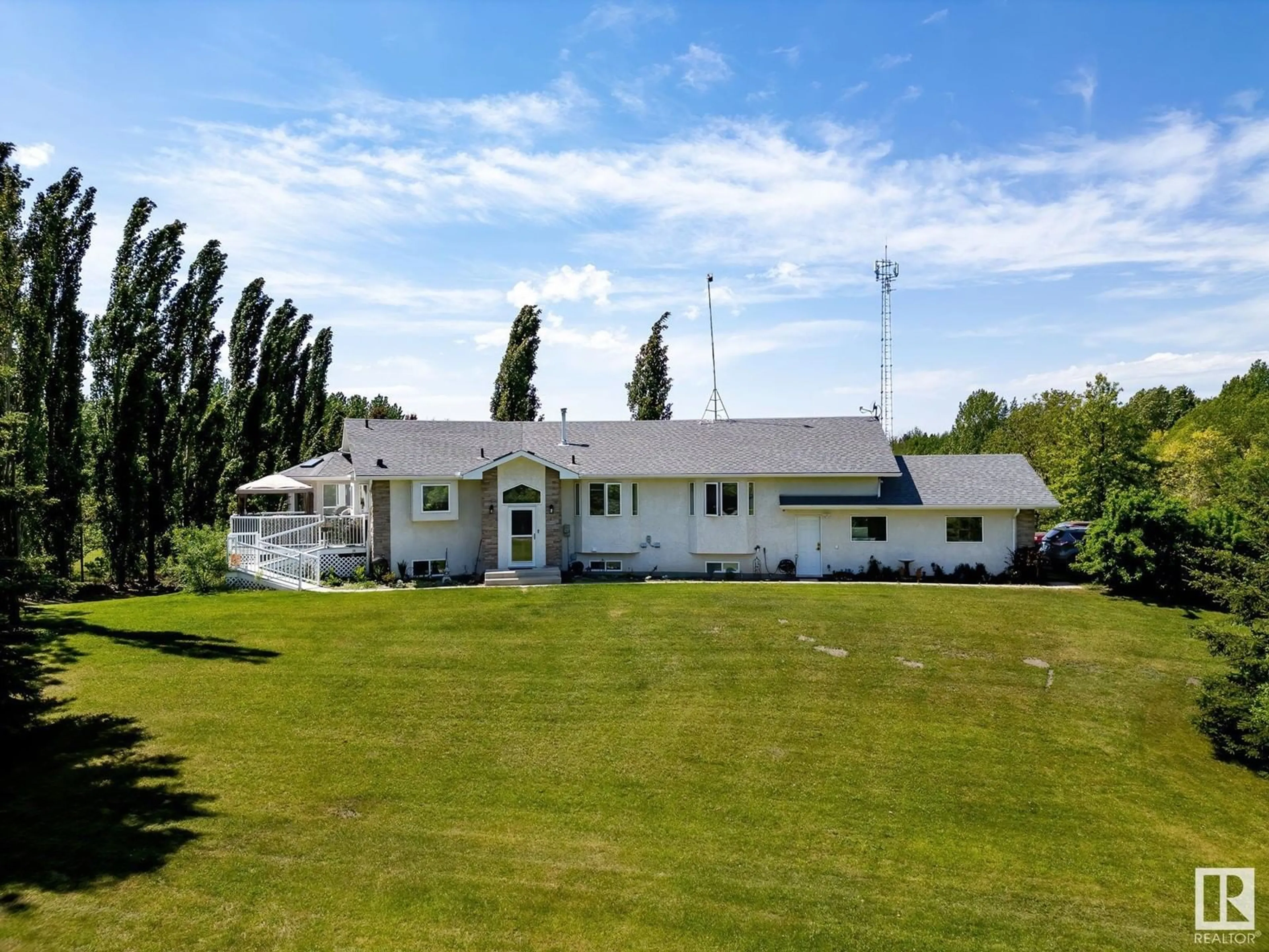 A pic from outside/outdoor area/front of a property/back of a property/a pic from drone, unknown for 22 - 52212 RGE ROAD 274, Rural Parkland County Alberta T7X3T8