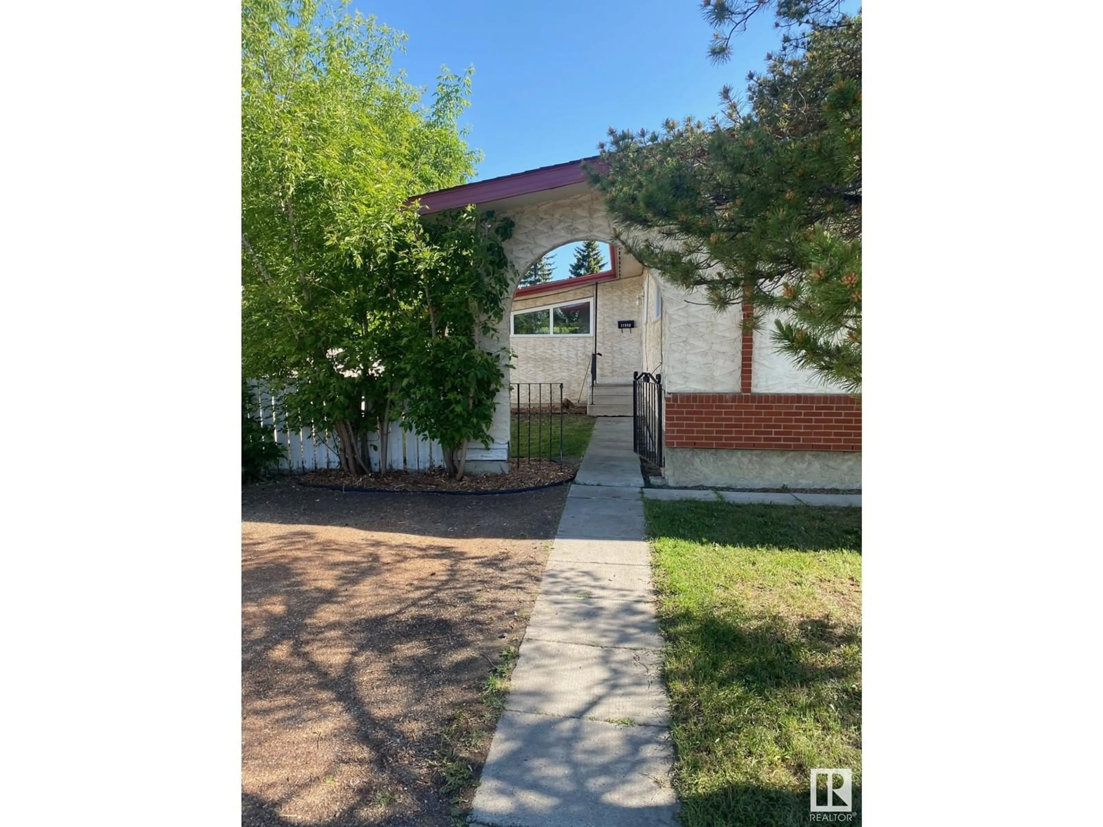 A pic from outside/outdoor area/front of a property/back of a property/a pic from drone, street for 11940 152B AV, Edmonton Alberta T5X1G4