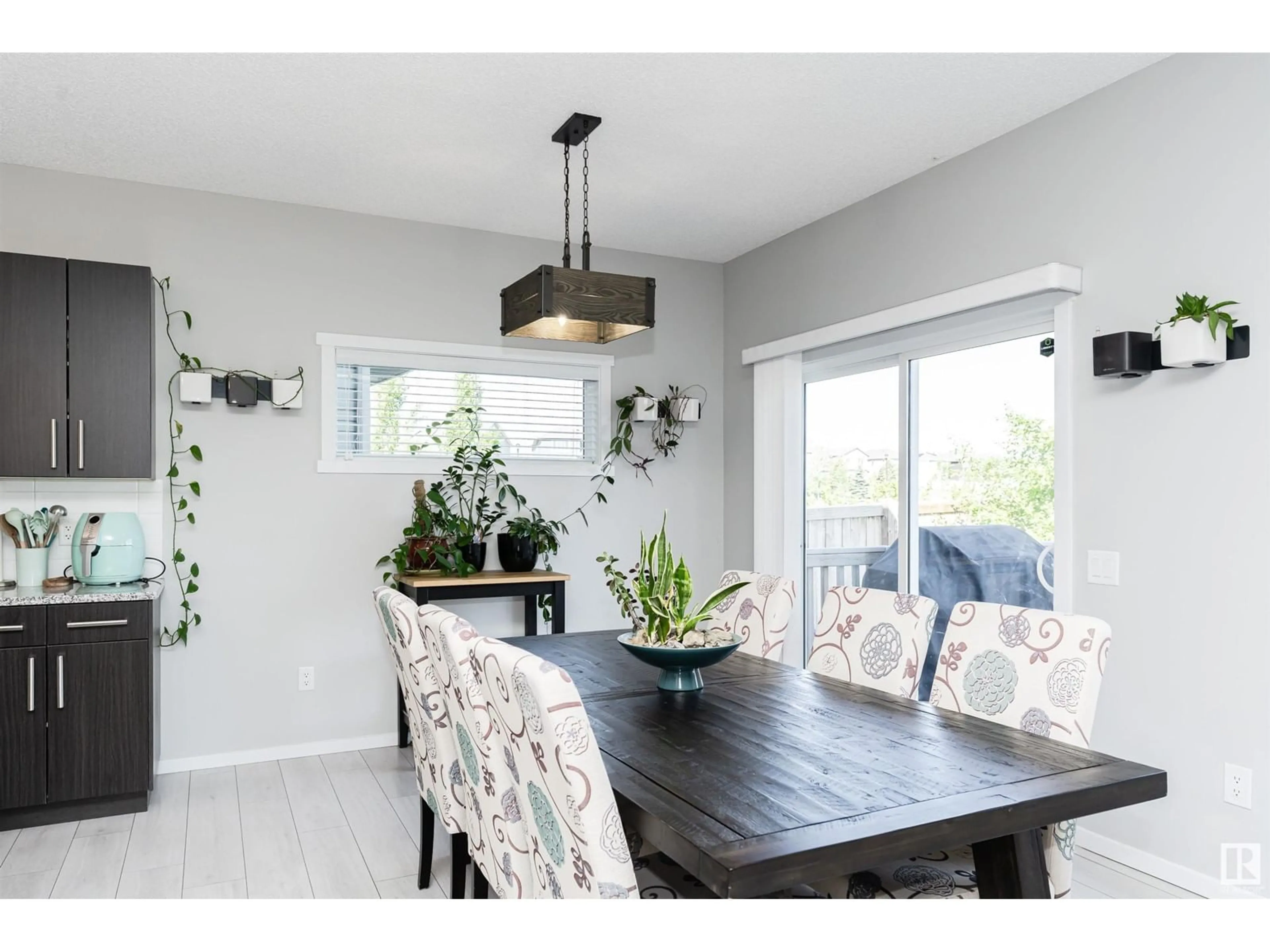 Dining room, wood/laminate floor for 4214 171A AV, Edmonton Alberta T5Y0Z7