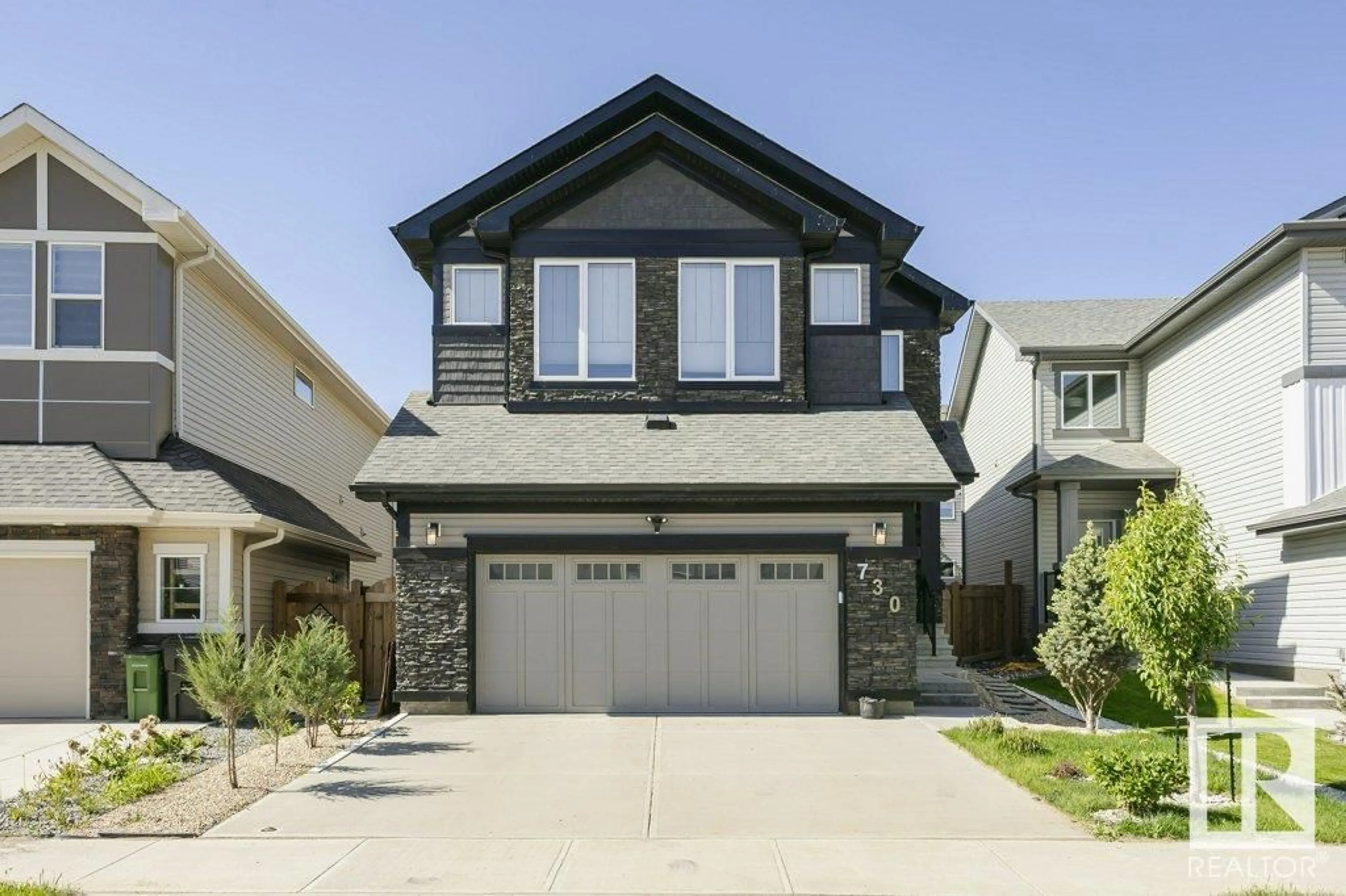 Home with vinyl exterior material, street for 730 KINGLET BV, Edmonton Alberta T5S0N9