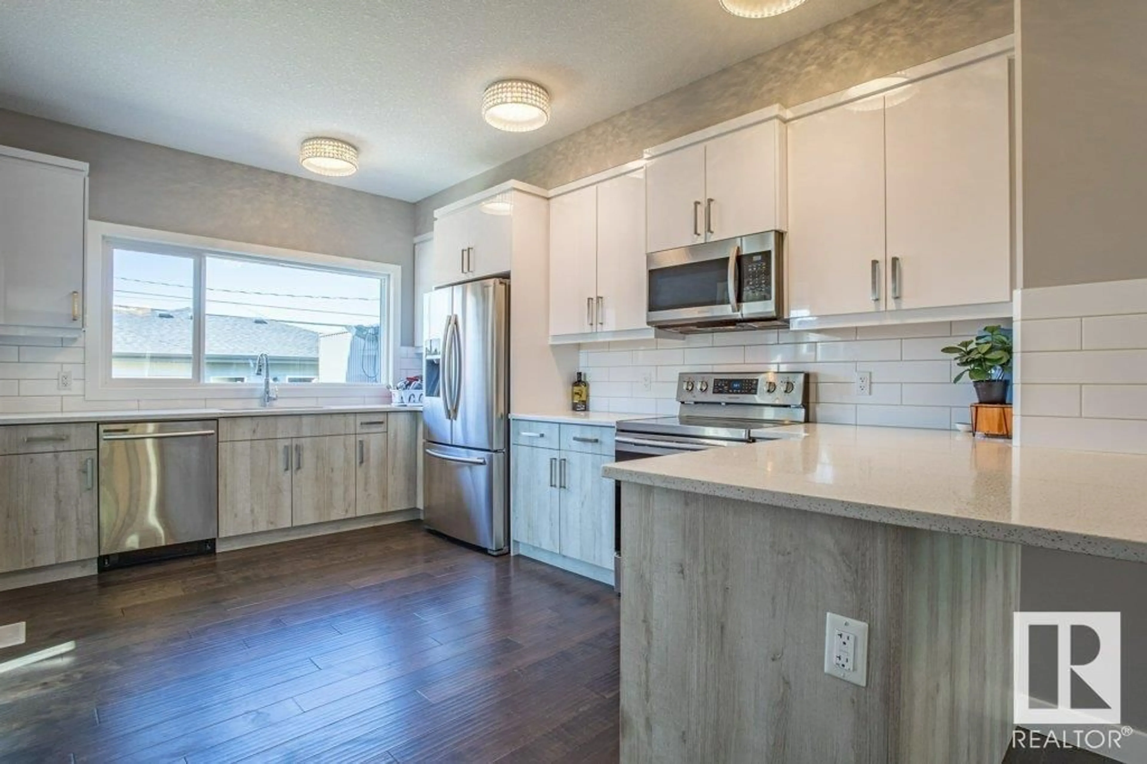 Open concept kitchen, unknown for 8956 81 AV, Edmonton Alberta T6C0W8
