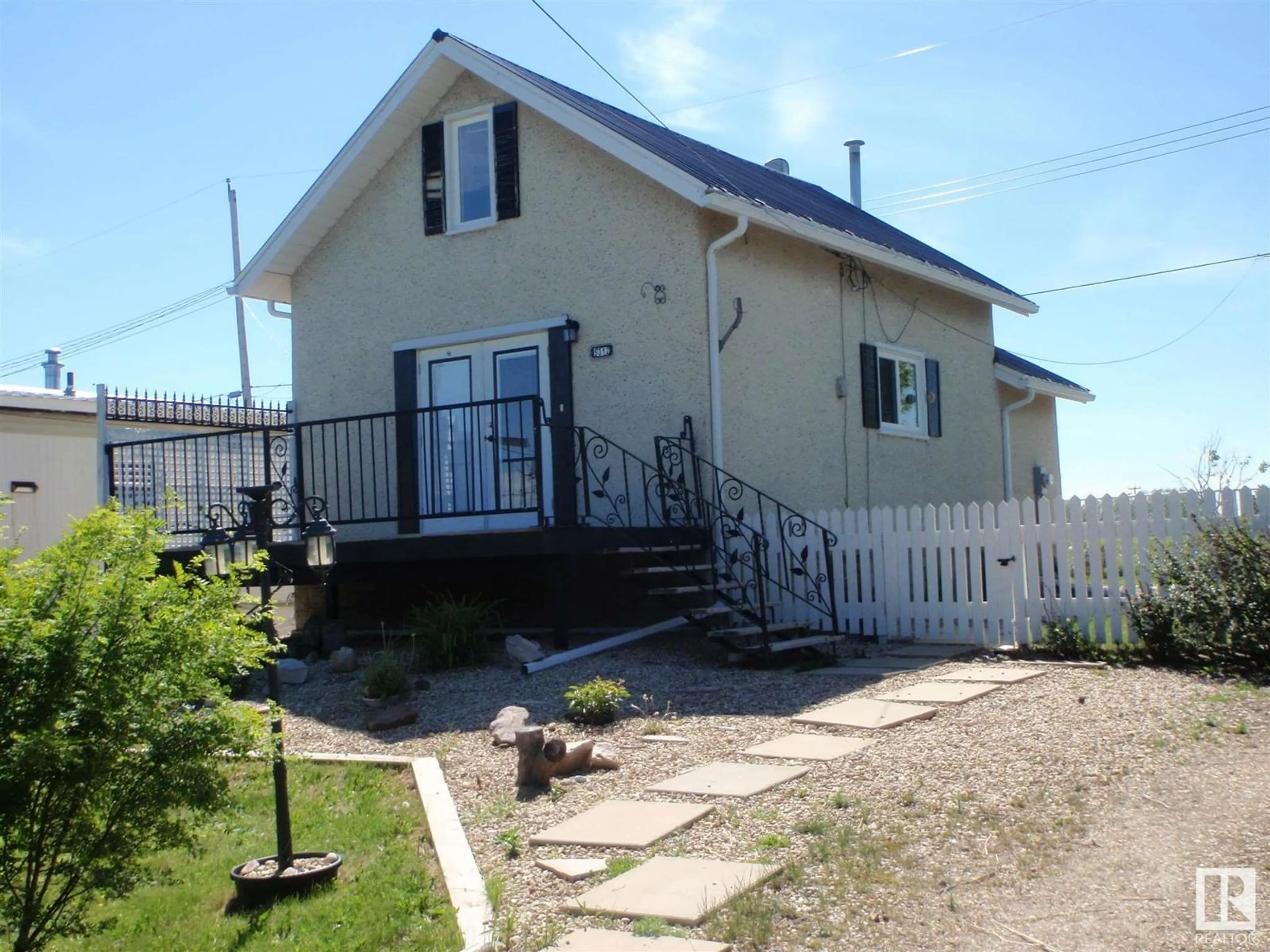 A pic from outside/outdoor area/front of a property/back of a property/a pic from drone, building for 5312 60 ST, Barrhead Alberta T7N1C1