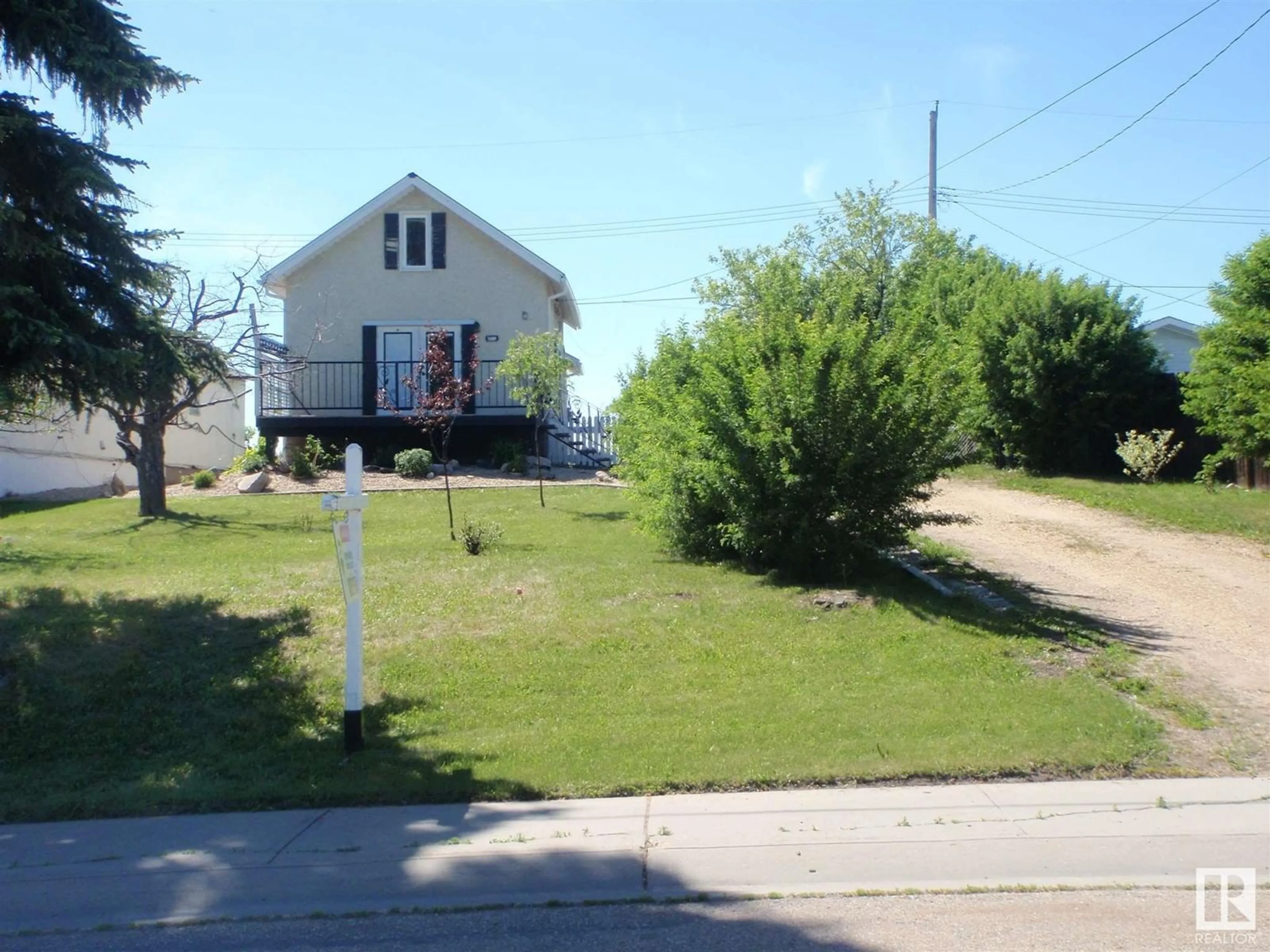 A pic from outside/outdoor area/front of a property/back of a property/a pic from drone, street for 5312 60 ST, Barrhead Alberta T7N1C1