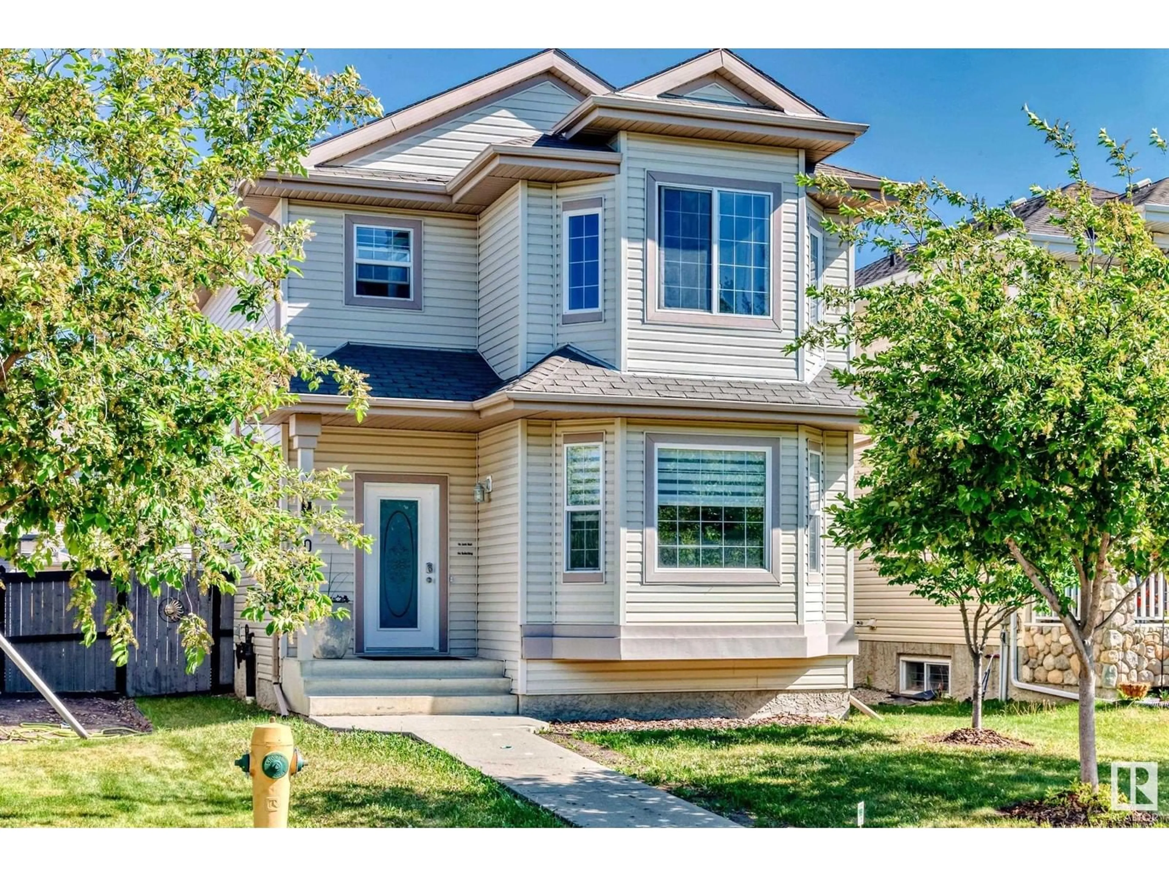 Home with vinyl exterior material, street for 106 KEYSTONE LN, Leduc Alberta T9E0J5