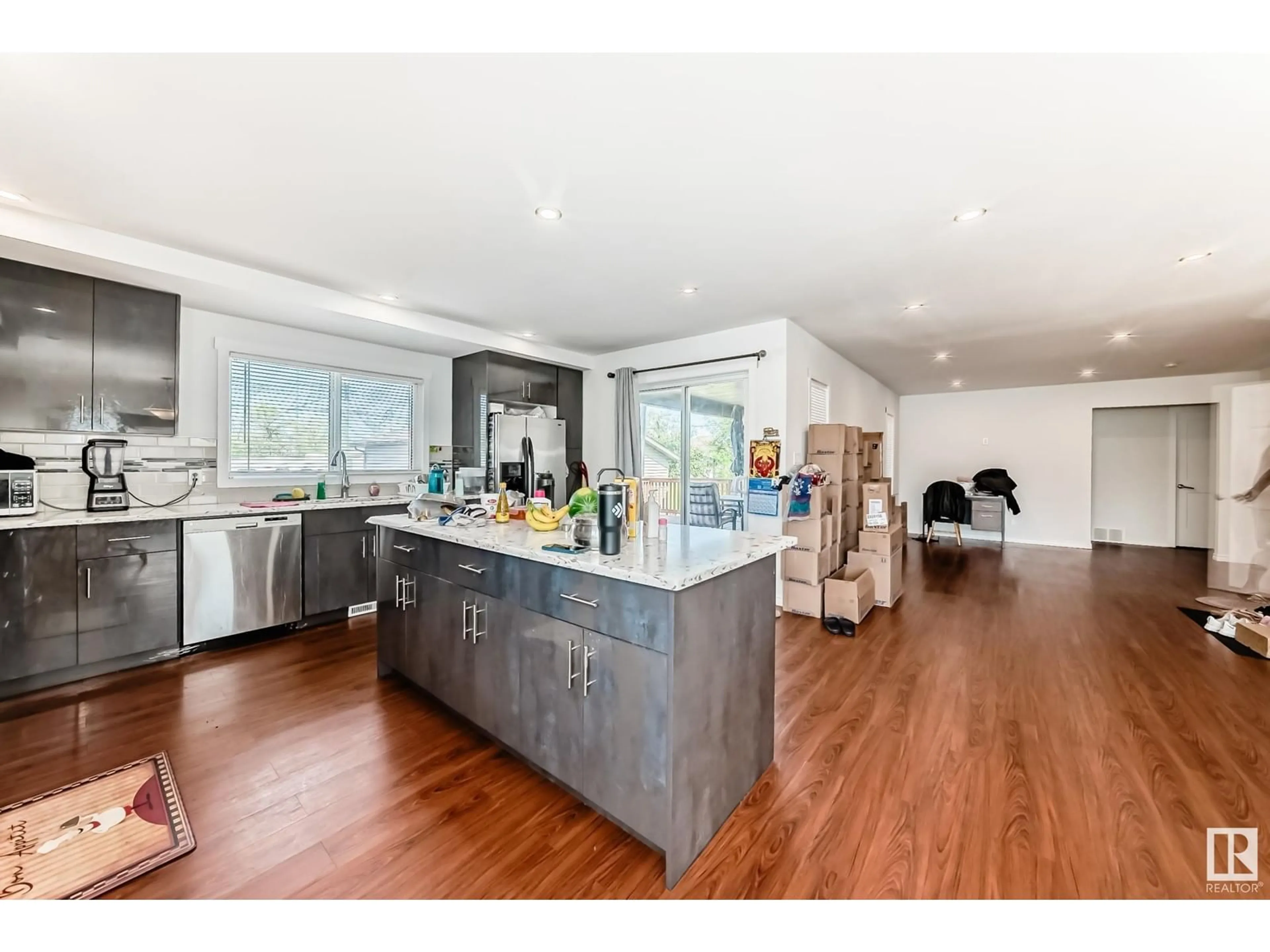 Open concept kitchen, wood/laminate floor for 4808 50 AV, Lamont Alberta T0B2R0
