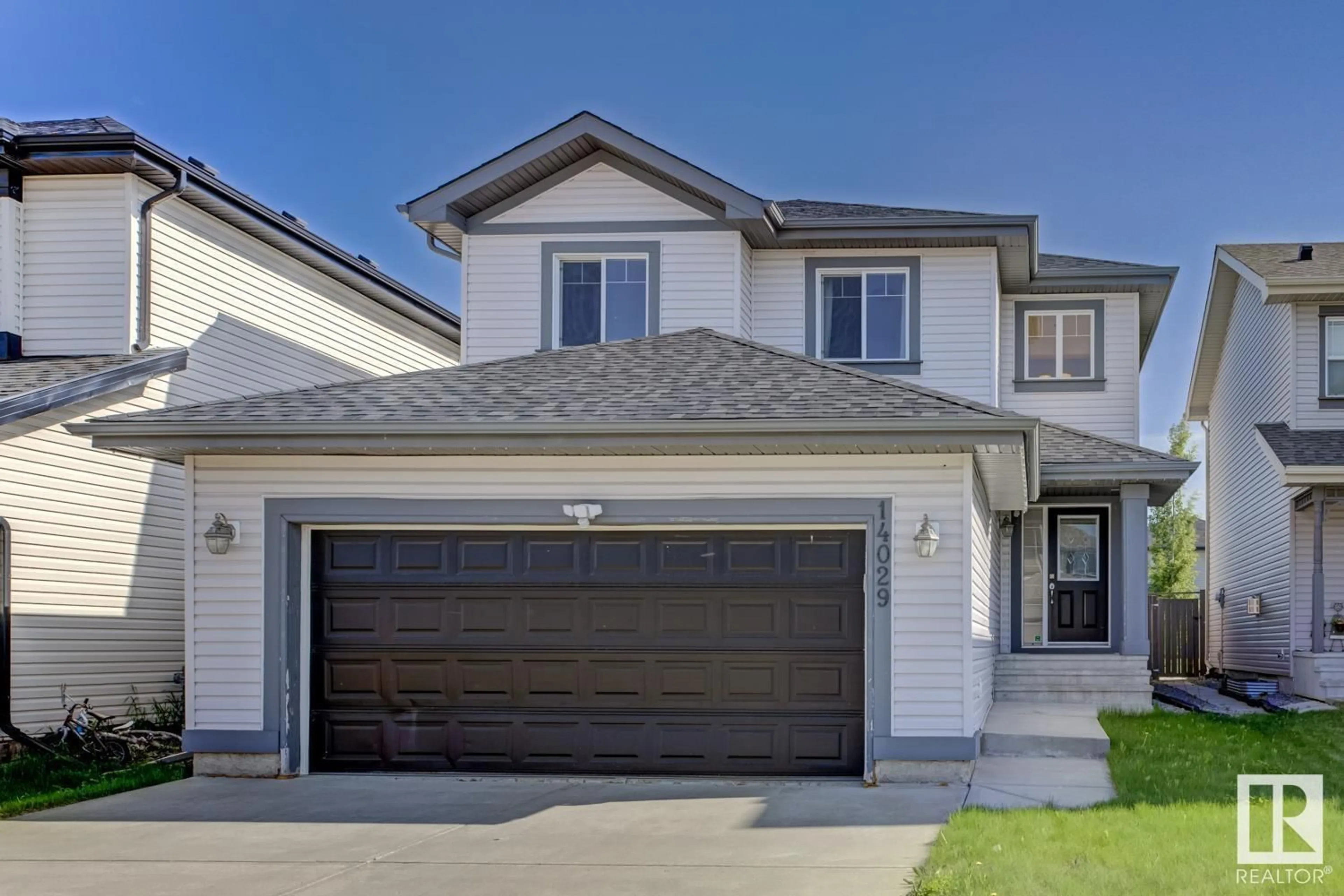 Home with vinyl exterior material, street for 14029 146 AV, Edmonton Alberta T6V1Y1