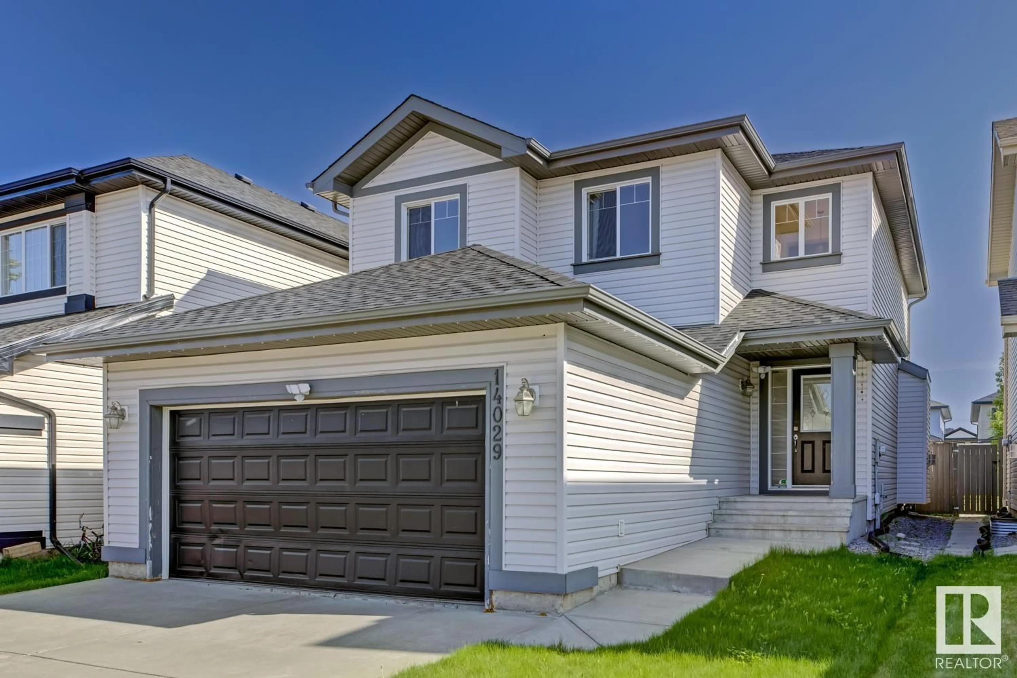Home with vinyl exterior material, street for 14029 146 AV, Edmonton Alberta T6V1Y1