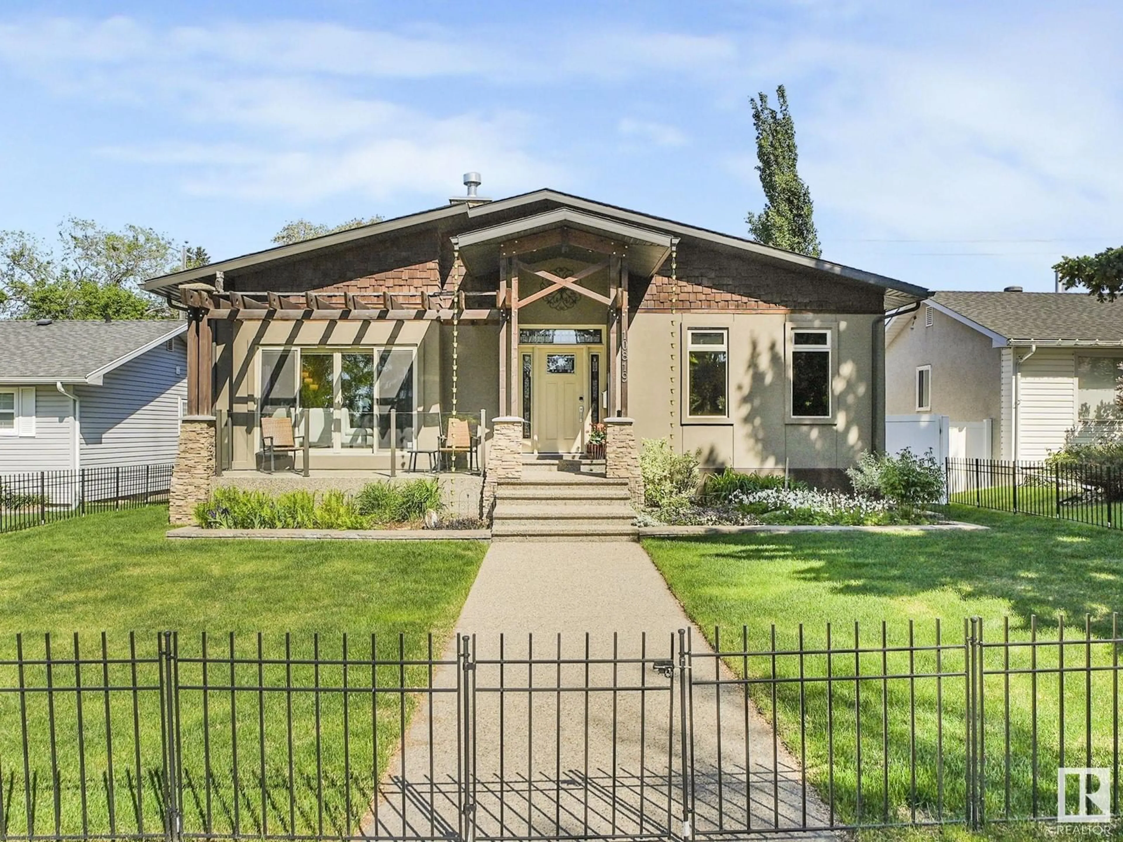 Home with brick exterior material, street for 10819 54 ST, Edmonton Alberta T6A2H8