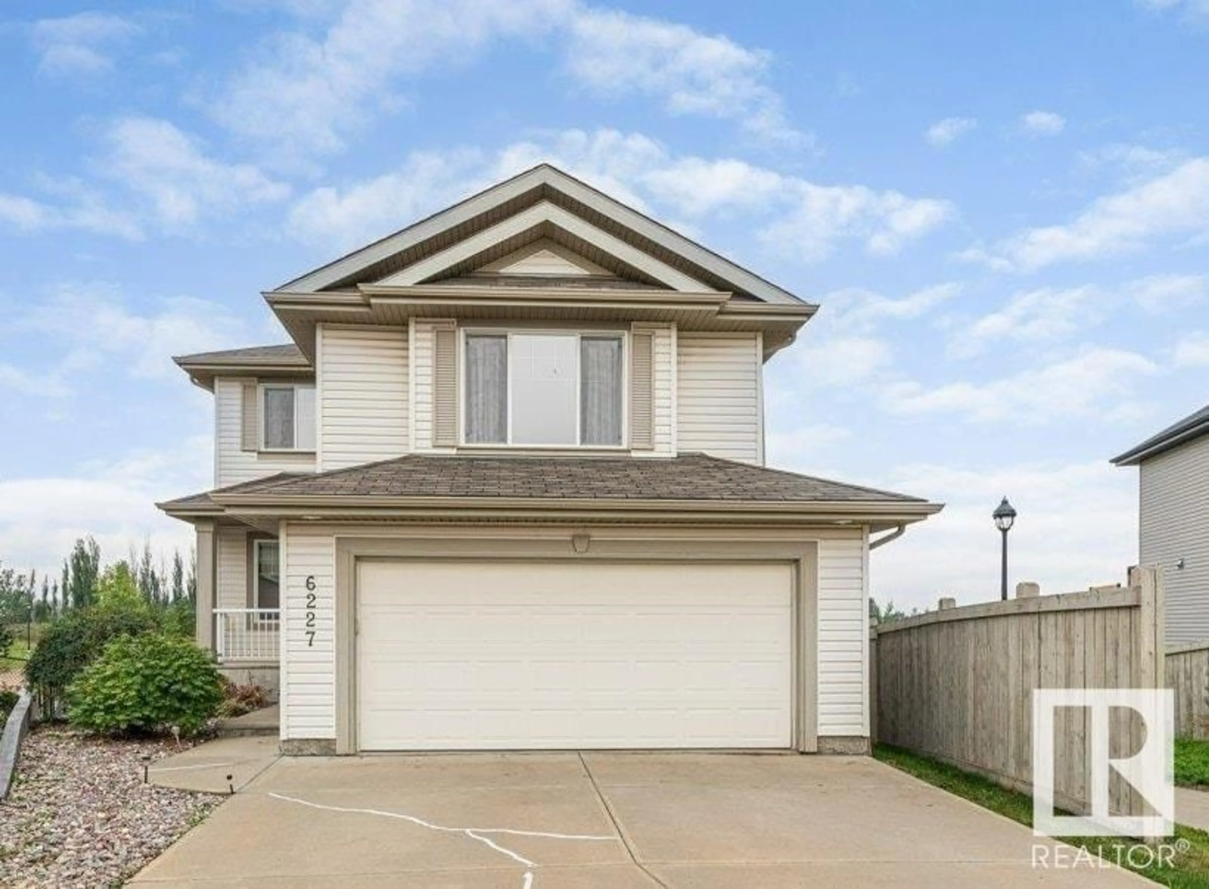 Home with vinyl exterior material, street for SW - 6227 5 AV, Edmonton Alberta T6X0E8