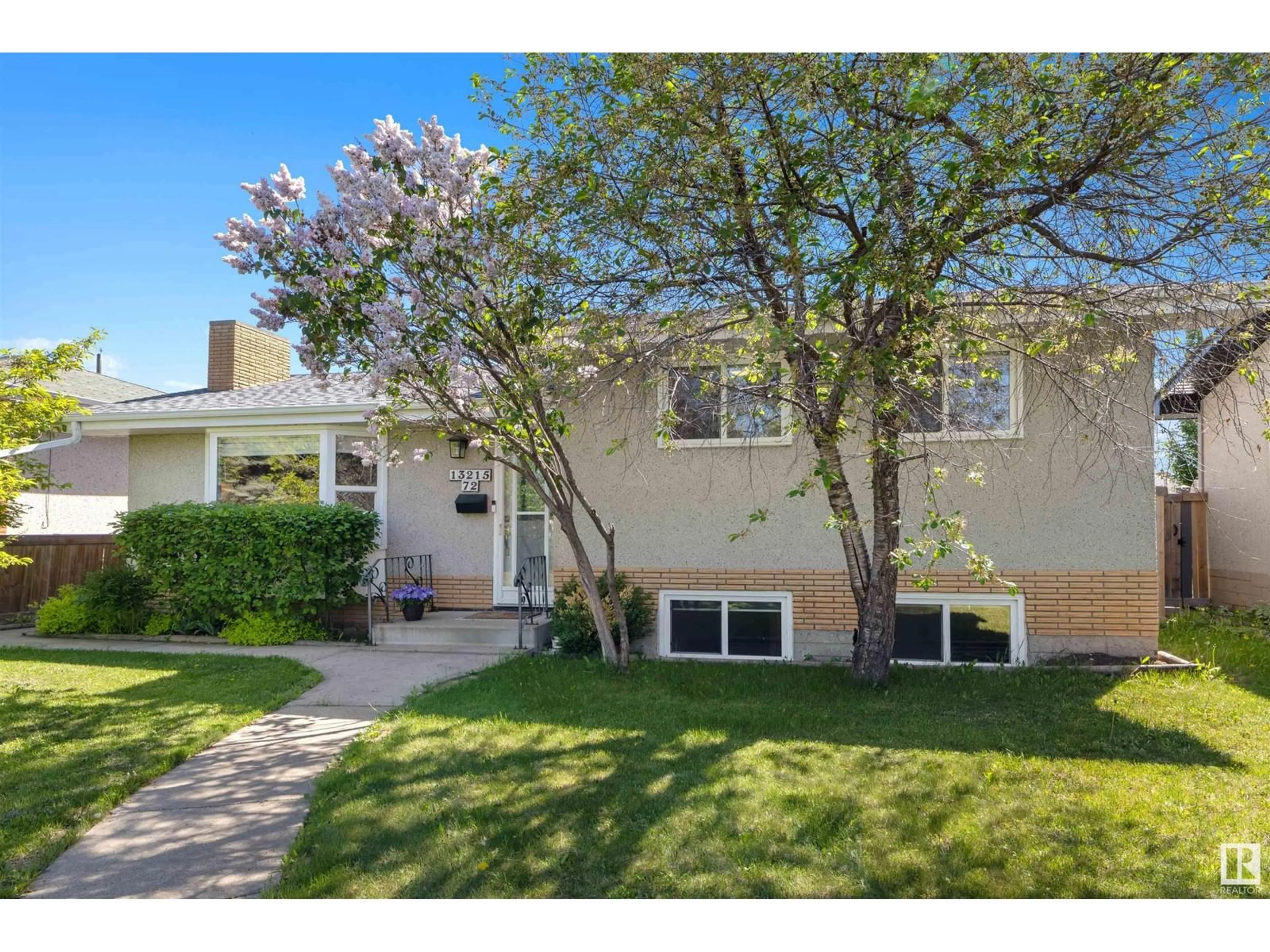 Home with vinyl exterior material, street for 13215 72 ST, Edmonton Alberta T5C0R1