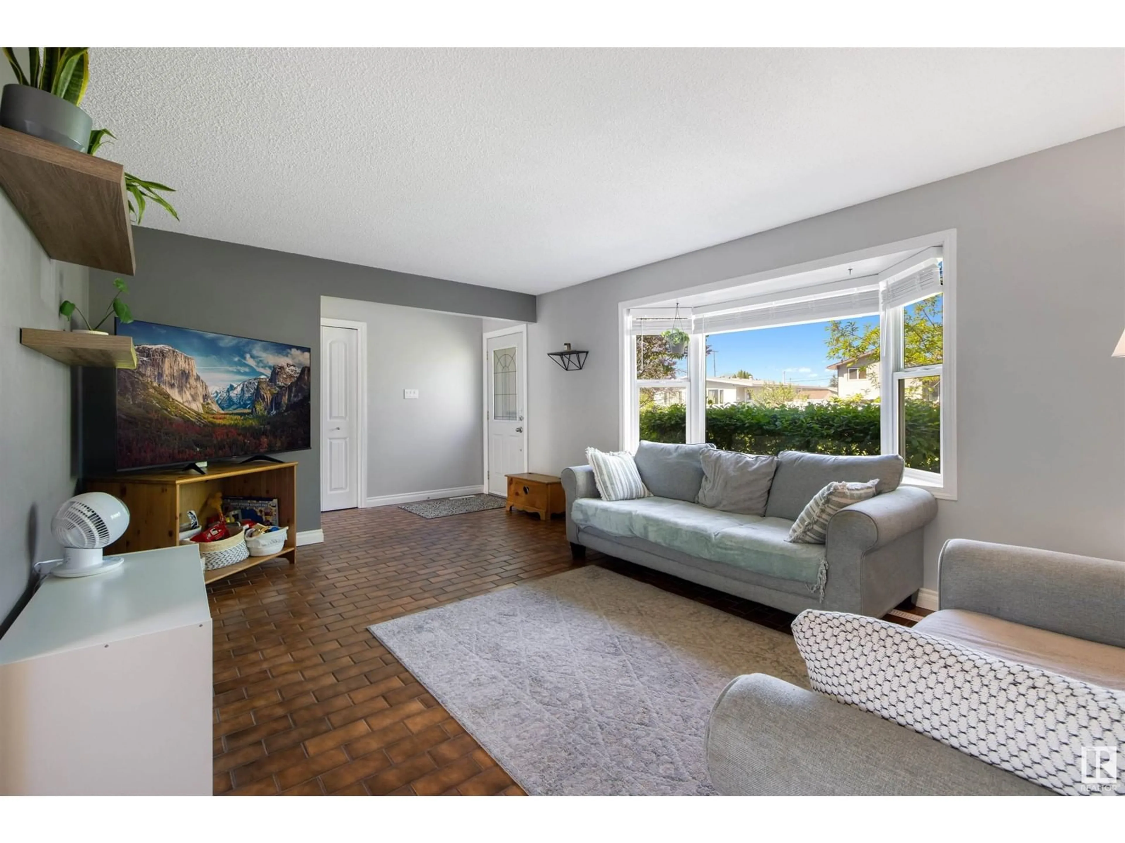 Living room with furniture, unknown for 13215 72 ST, Edmonton Alberta T5C0R1