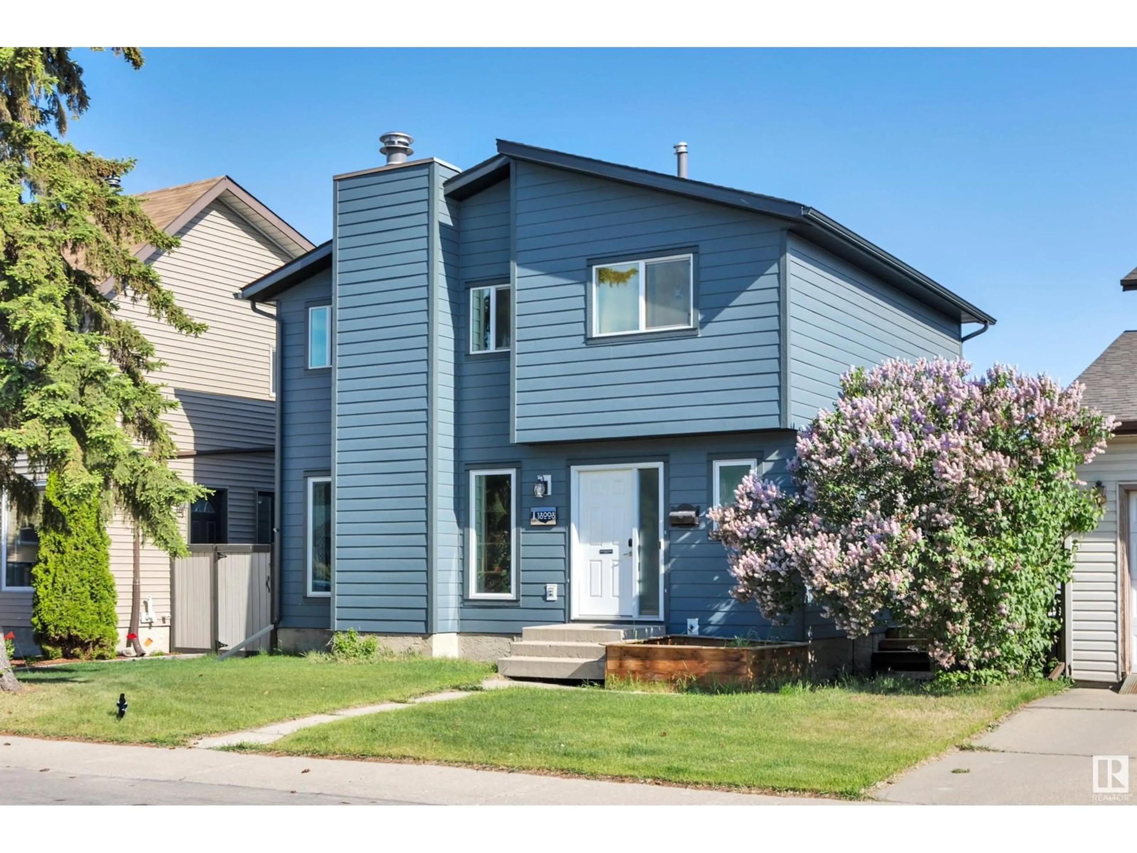 Home with vinyl exterior material, street for 18008 75 AV, Edmonton Alberta T5T2H2
