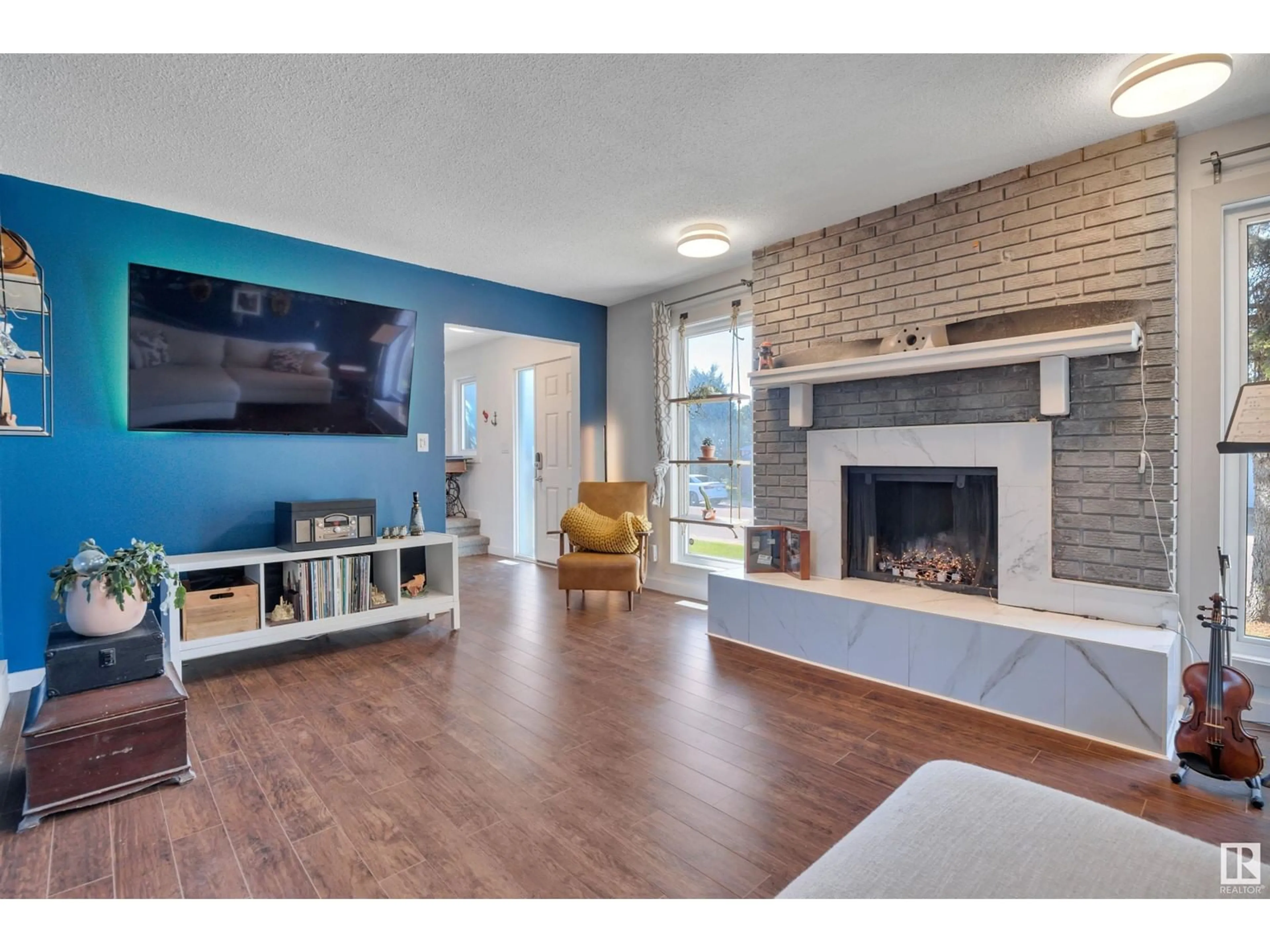 Living room with furniture, unknown for 18008 75 AV, Edmonton Alberta T5T2H2