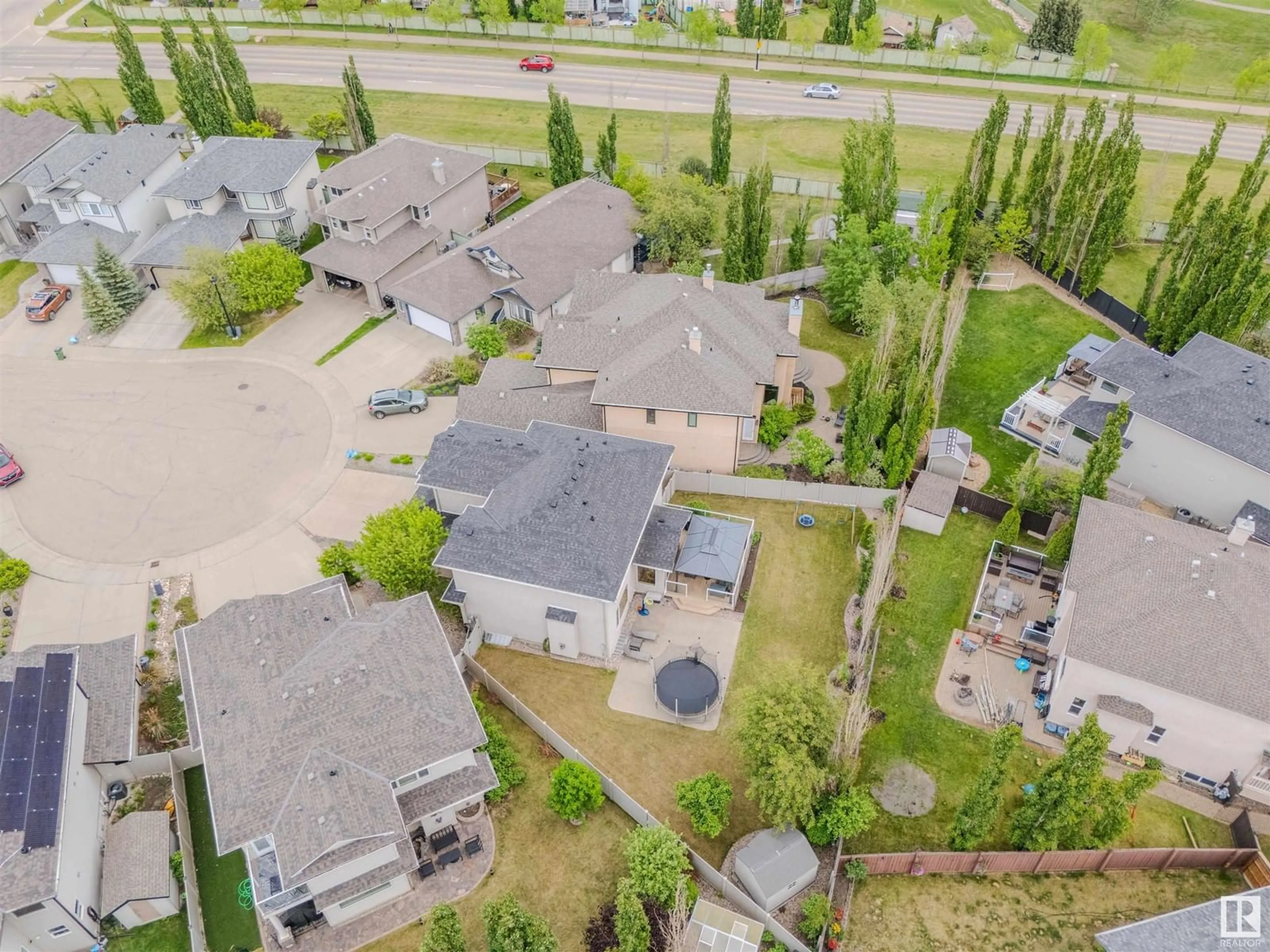 A pic from outside/outdoor area/front of a property/back of a property/a pic from drone, street for NW - 8704 207 ST, Edmonton Alberta T5T6Y1