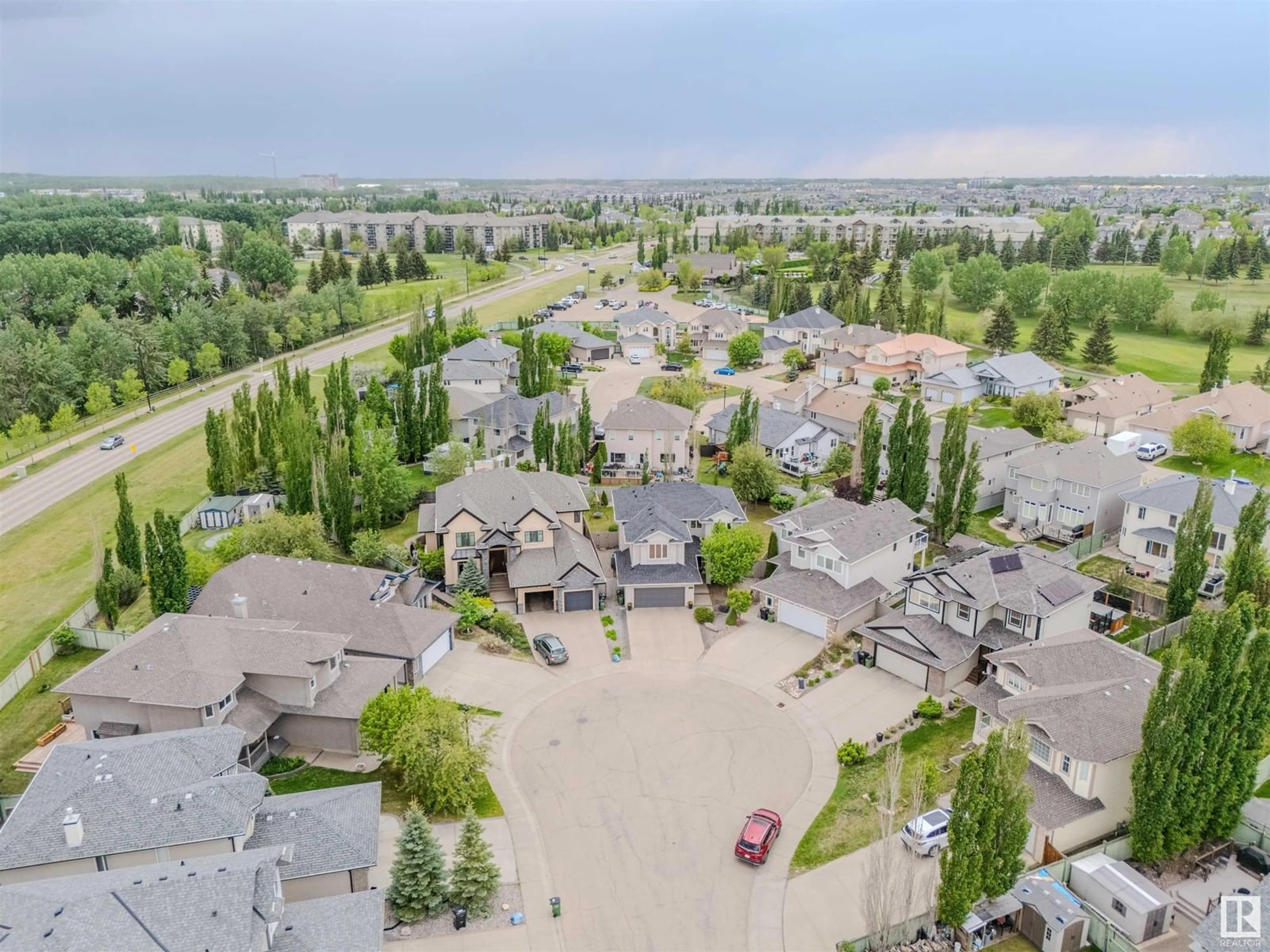 A pic from outside/outdoor area/front of a property/back of a property/a pic from drone, street for NW - 8704 207 ST, Edmonton Alberta T5T6Y1