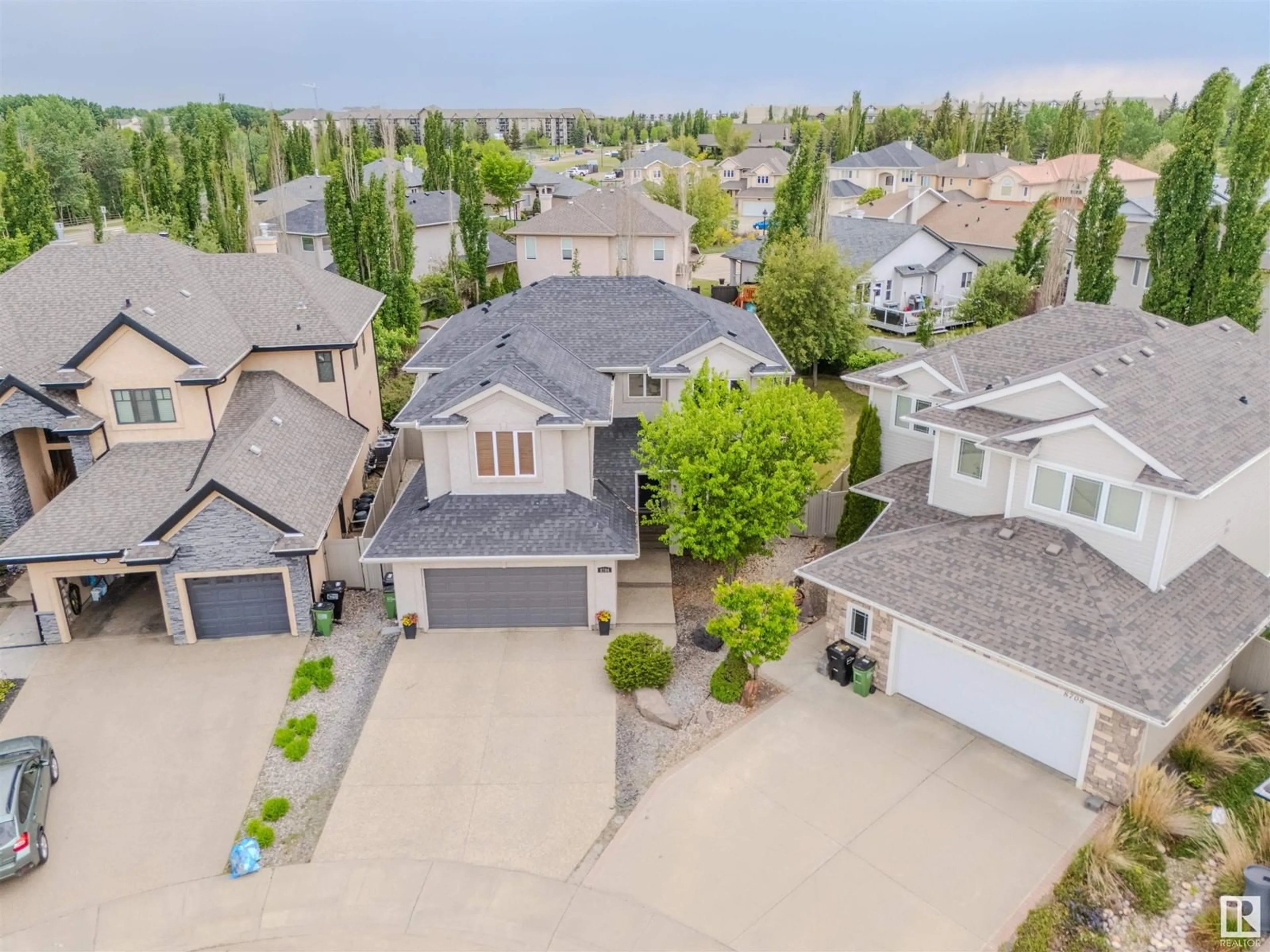 A pic from outside/outdoor area/front of a property/back of a property/a pic from drone, street for NW - 8704 207 ST, Edmonton Alberta T5T6Y1
