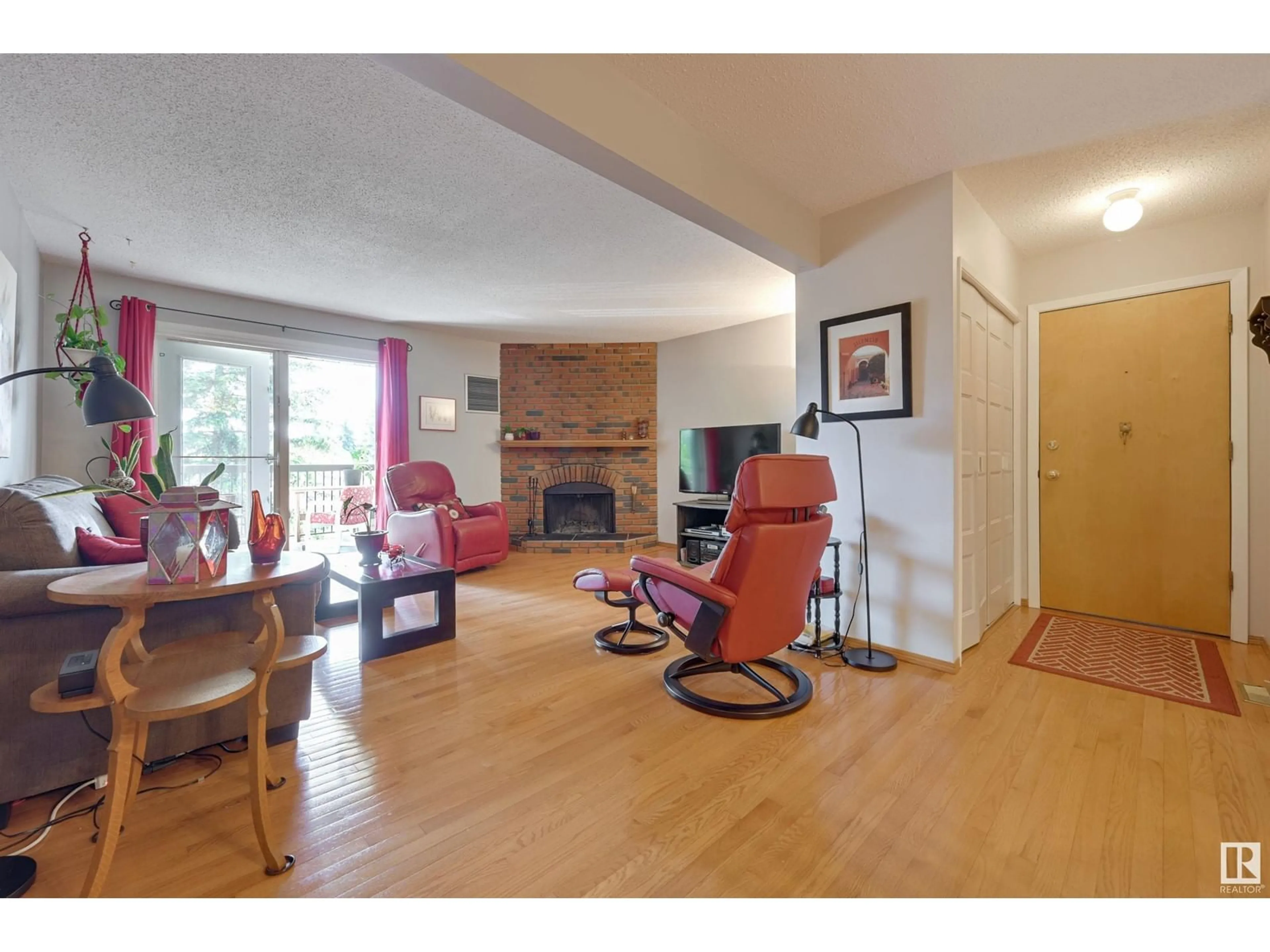 Living room with furniture, wood/laminate floor for #301 - 2908 105A ST, Edmonton Alberta T6H3K2