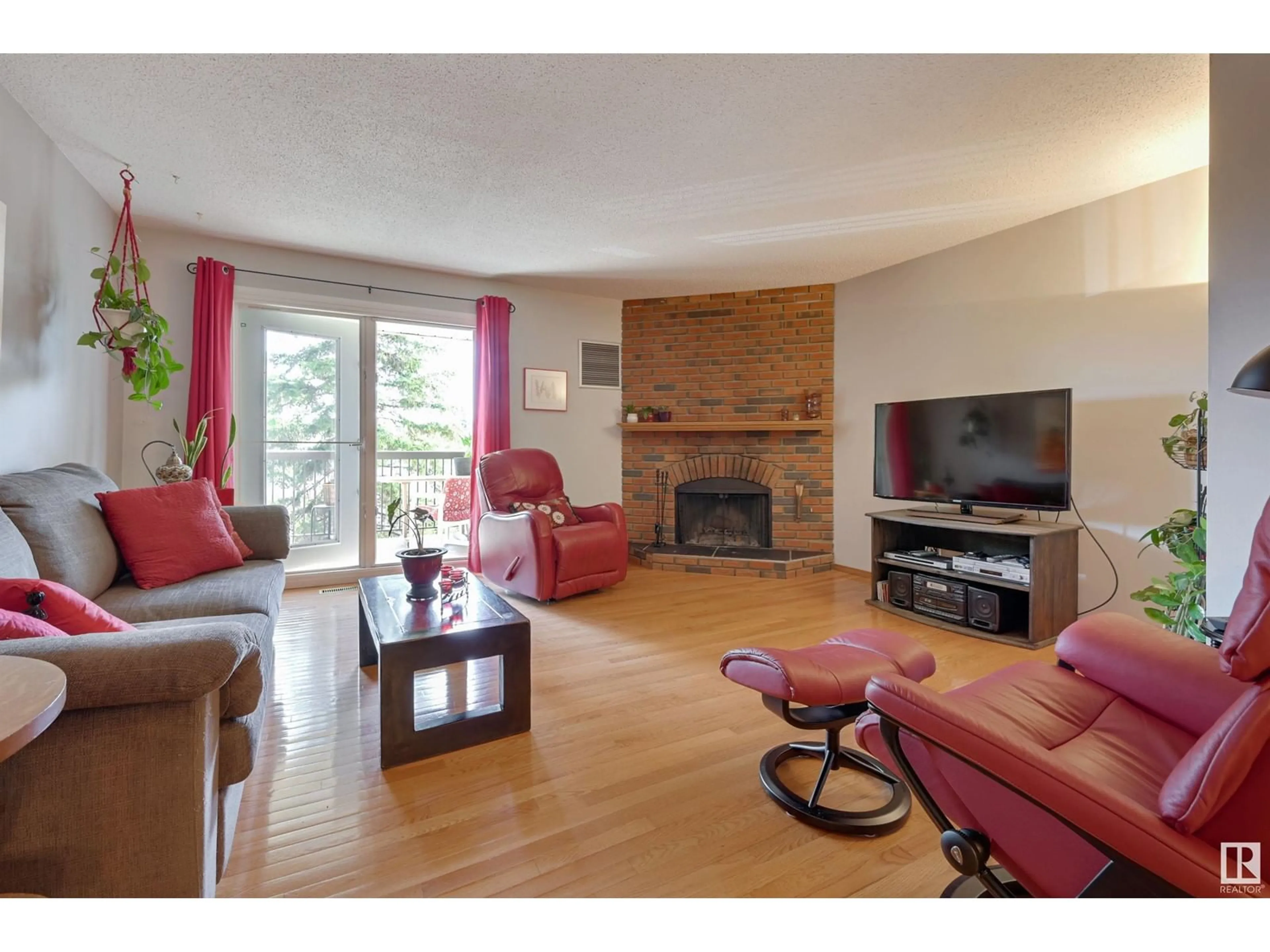 Living room with furniture, wood/laminate floor for #301 - 2908 105A ST, Edmonton Alberta T6H3K2