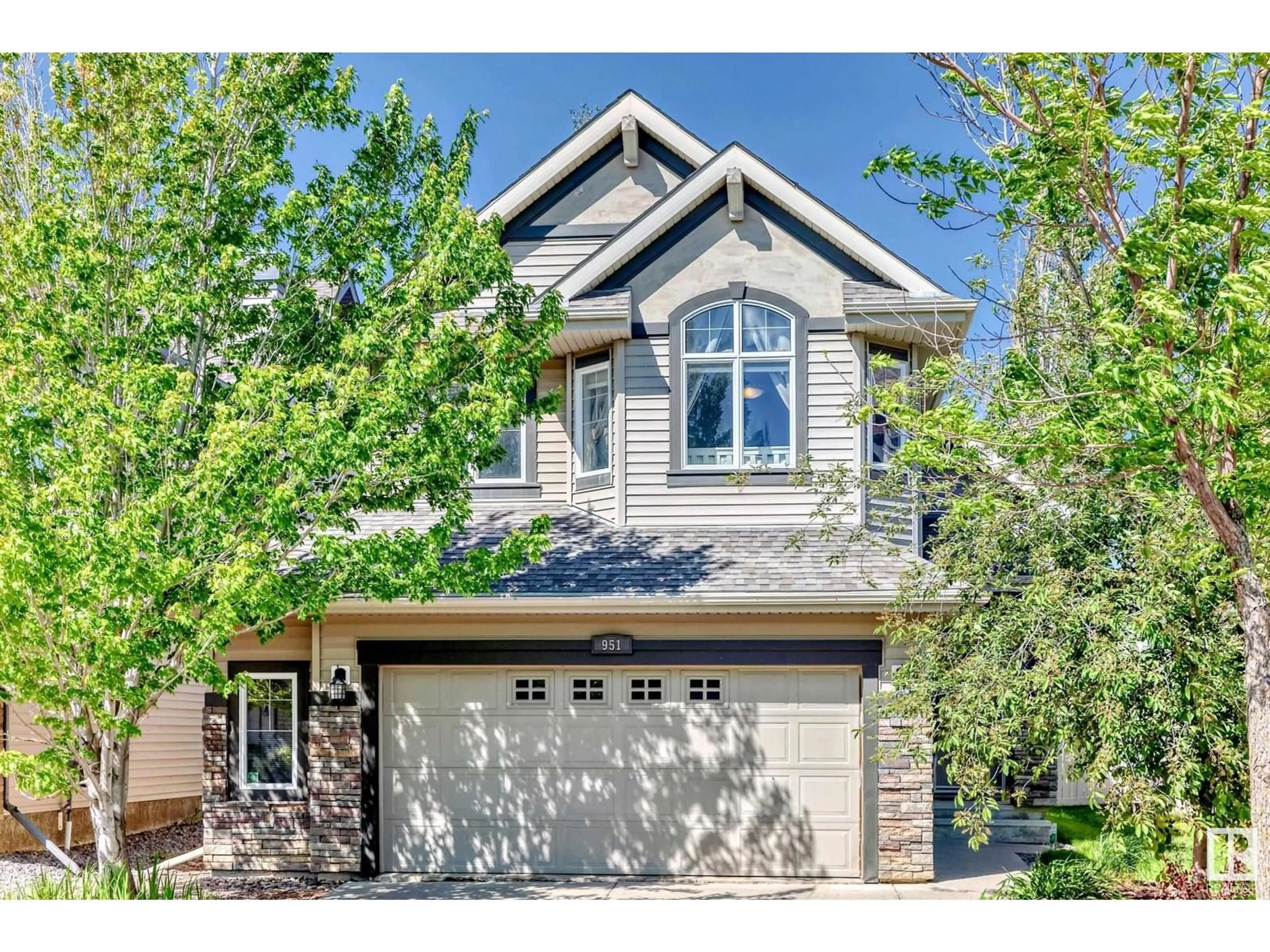 Home with vinyl exterior material, street for NW - 951 CHAHLEY CR, Edmonton Alberta T6M0C8