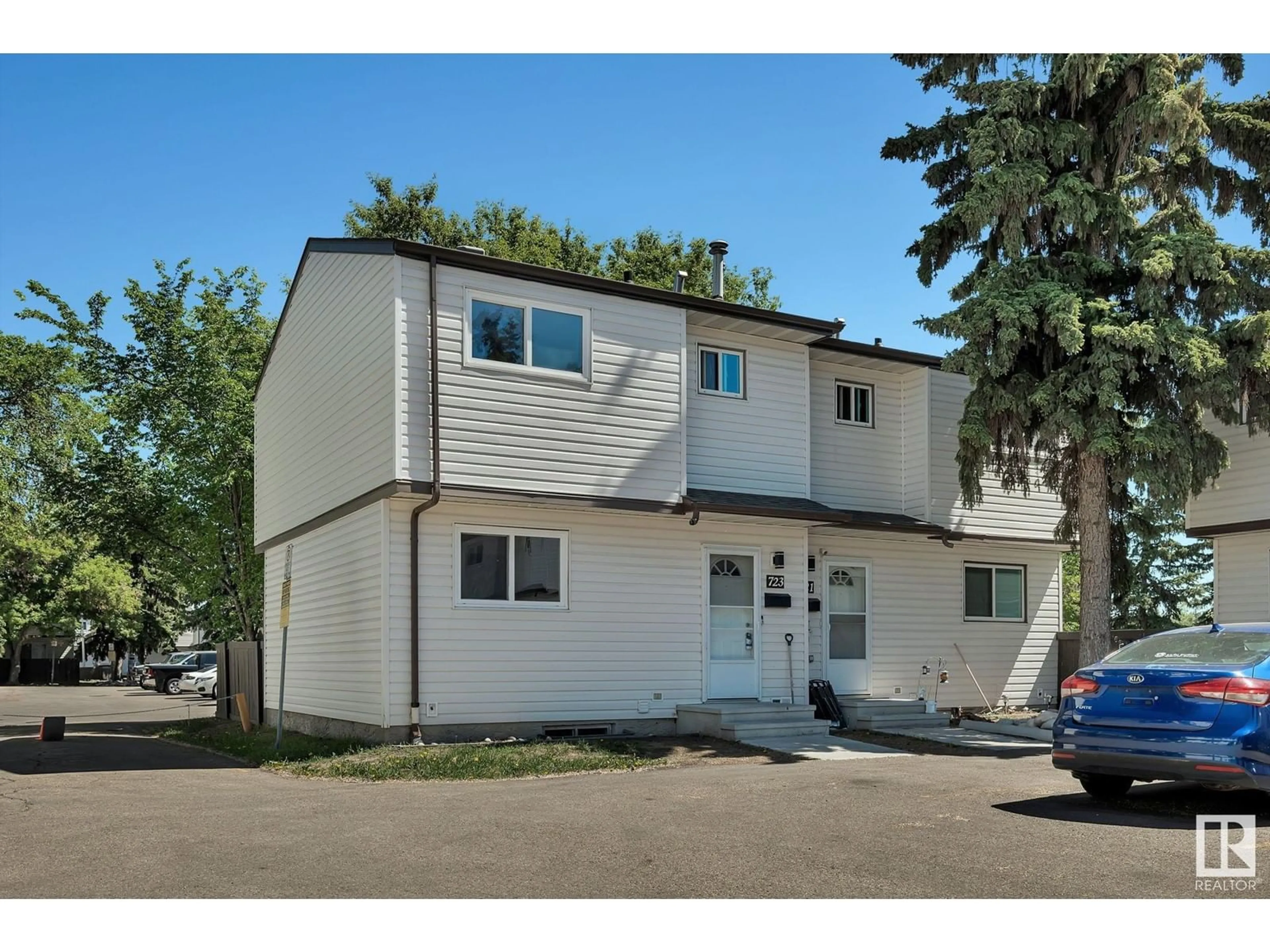 Home with vinyl exterior material, street for 723 CLAREVIEW RD, Edmonton Alberta T5A3S6