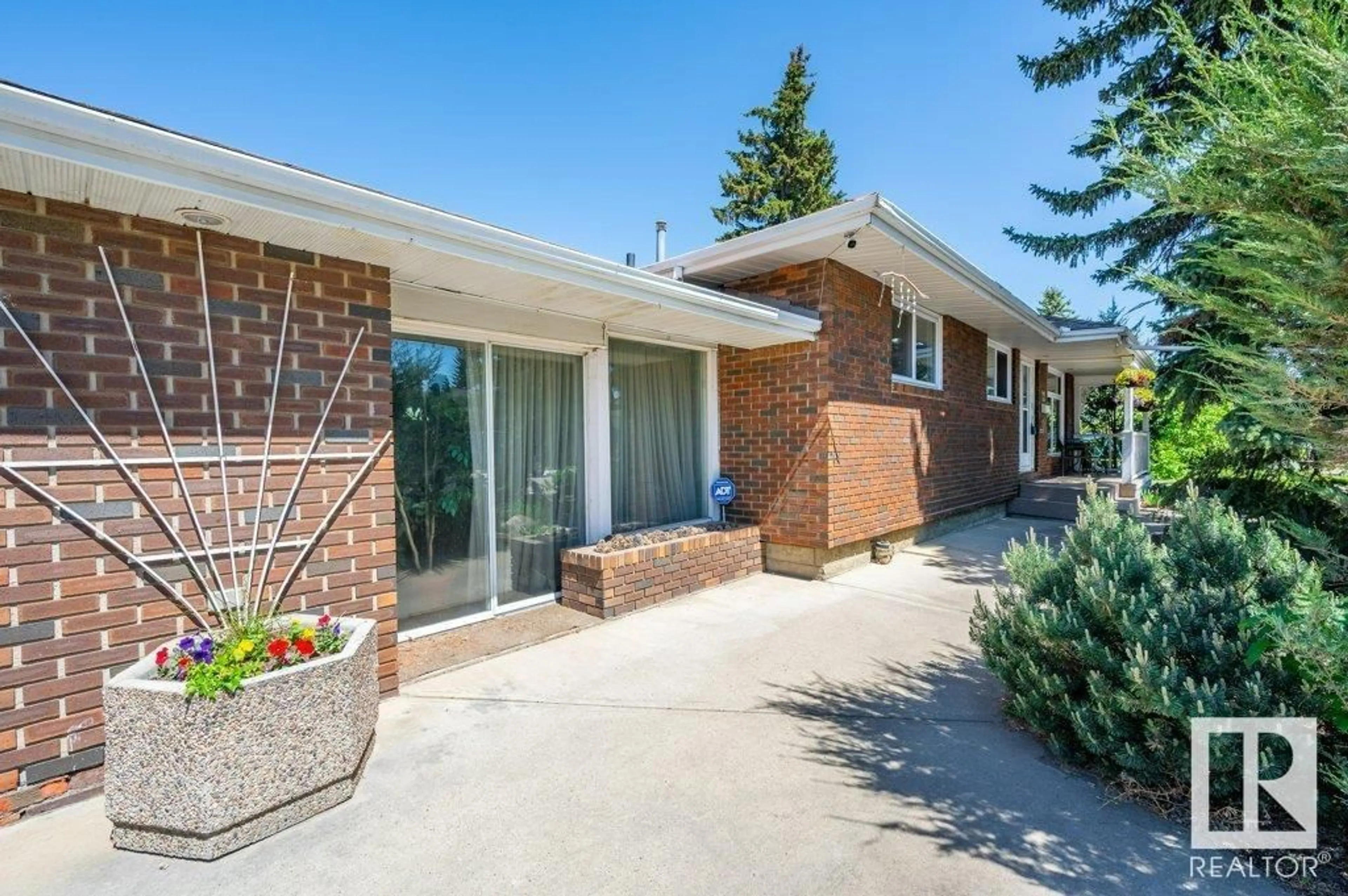 Home with brick exterior material, street for 9304 128A AV, Edmonton Alberta T5E0J9