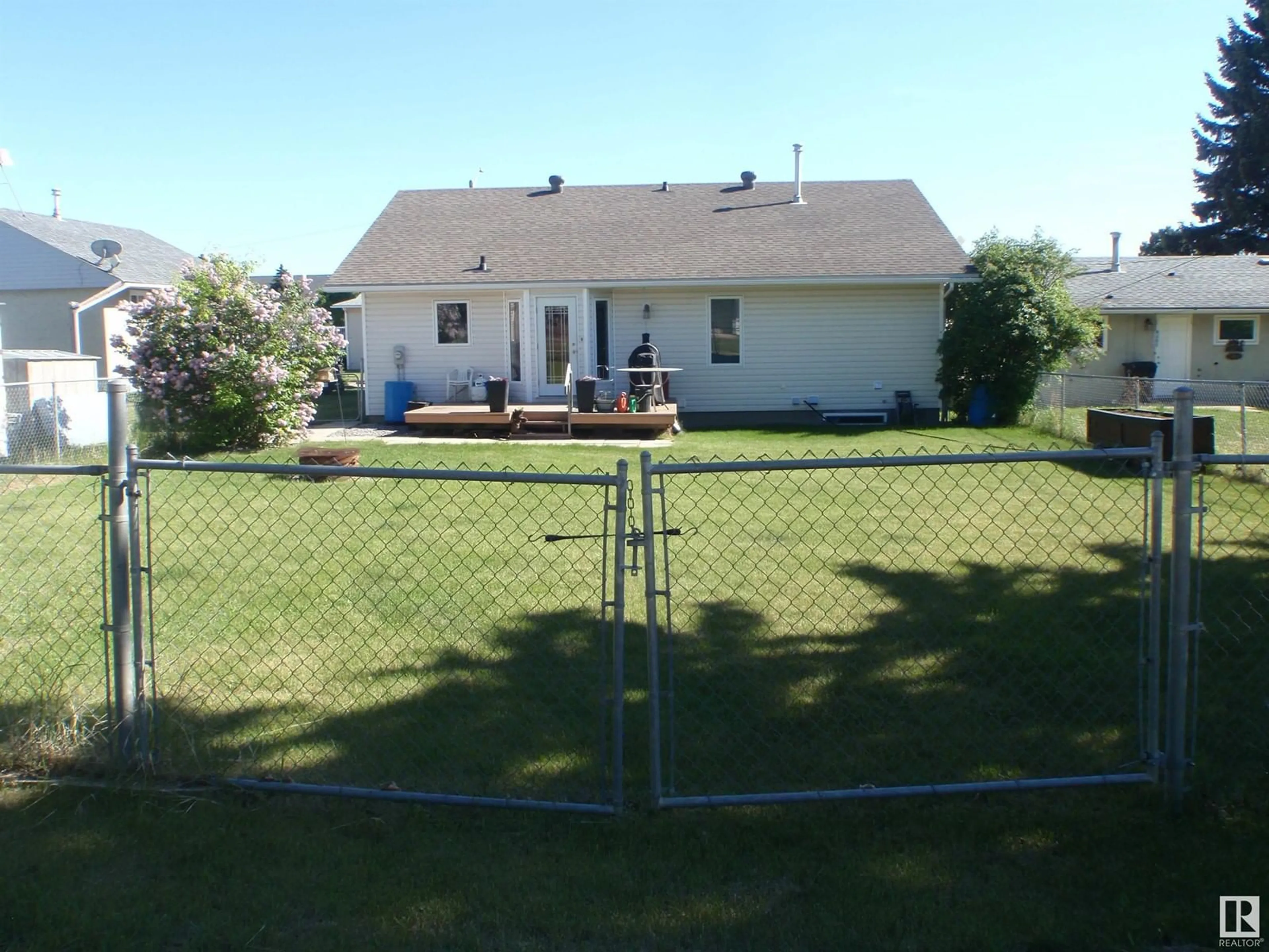 A pic from outside/outdoor area/front of a property/back of a property/a pic from drone, mountain view for 4412 53 AV, Barrhead Alberta T7N1J8