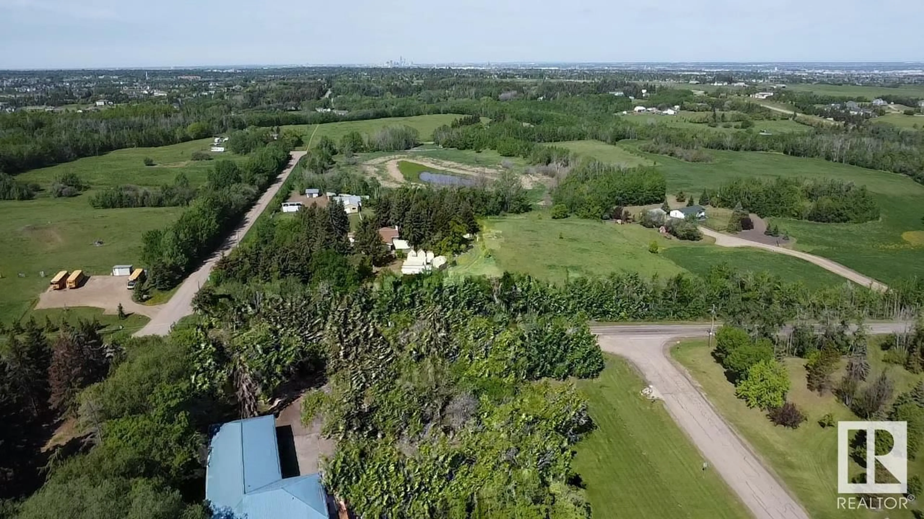 A pic from outside/outdoor area/front of a property/back of a property/a pic from drone, unknown for 52551 RGE ROAD 225, Rural Strathcona County Alberta T8A4R9