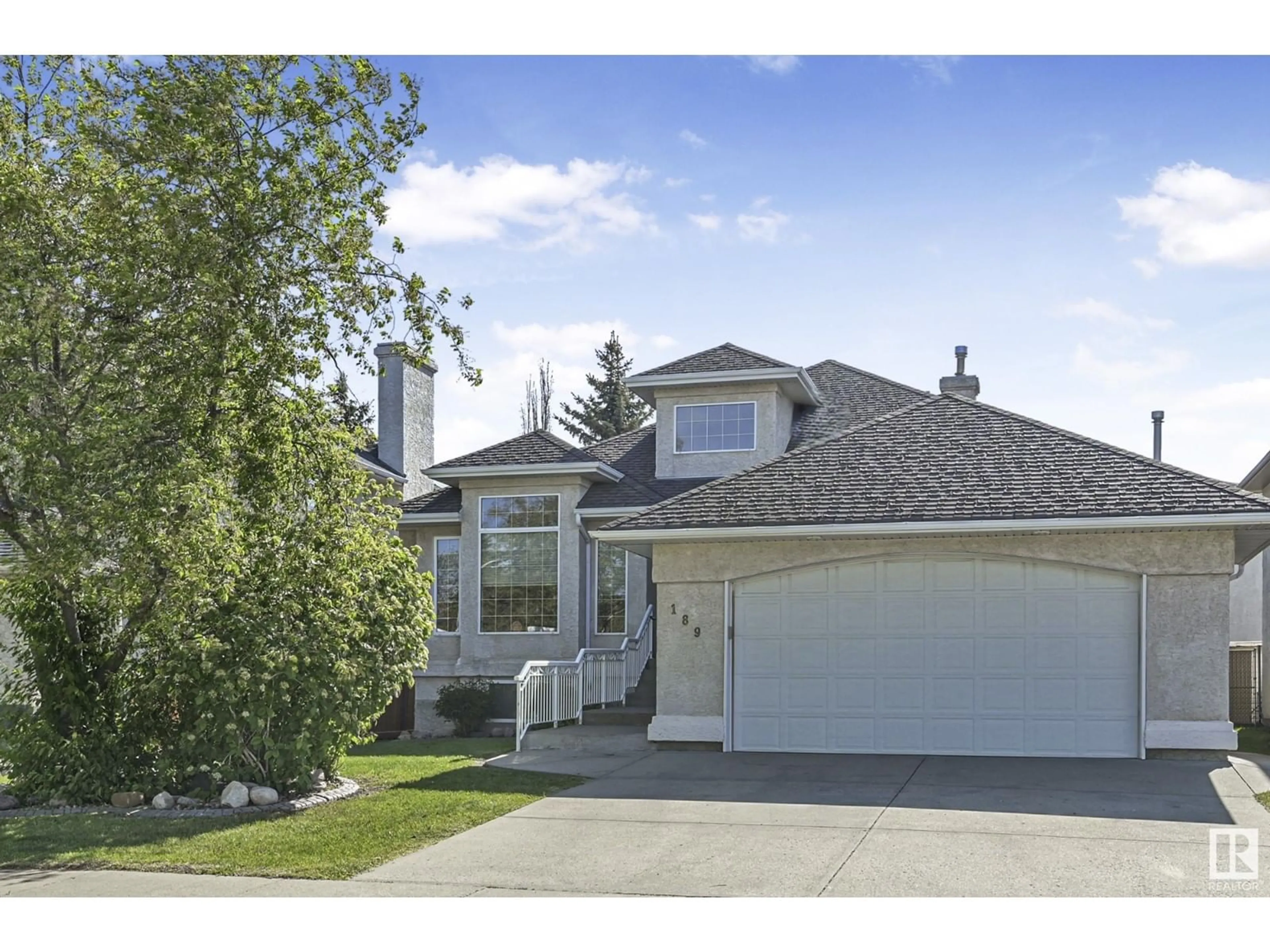 Home with vinyl exterior material, street for 189 KULAWY DR, Edmonton Alberta T6L7E4