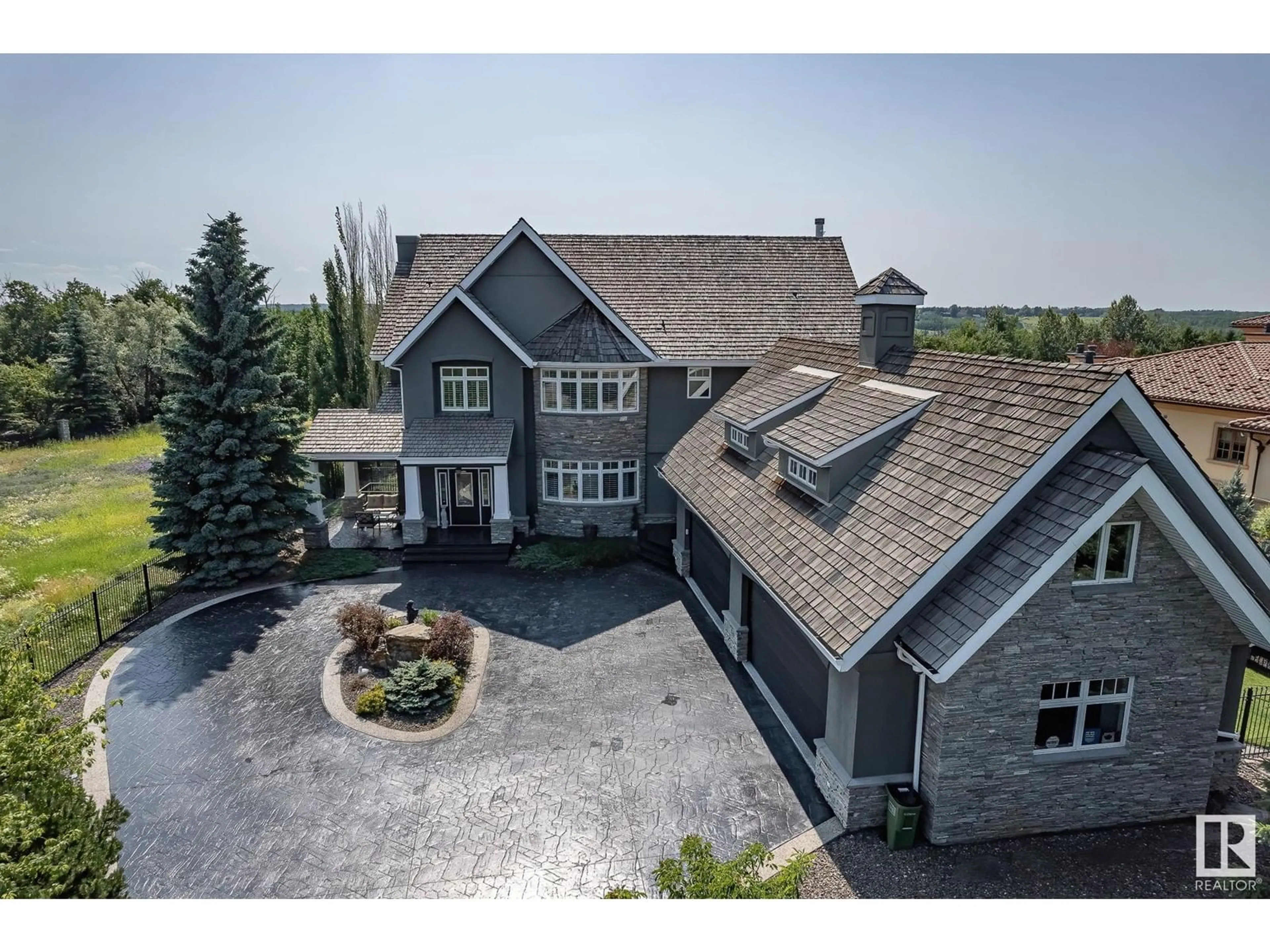 A pic from outside/outdoor area/front of a property/back of a property/a pic from drone, unknown for 60 WINDERMERE DR, Edmonton Alberta T6W0S1