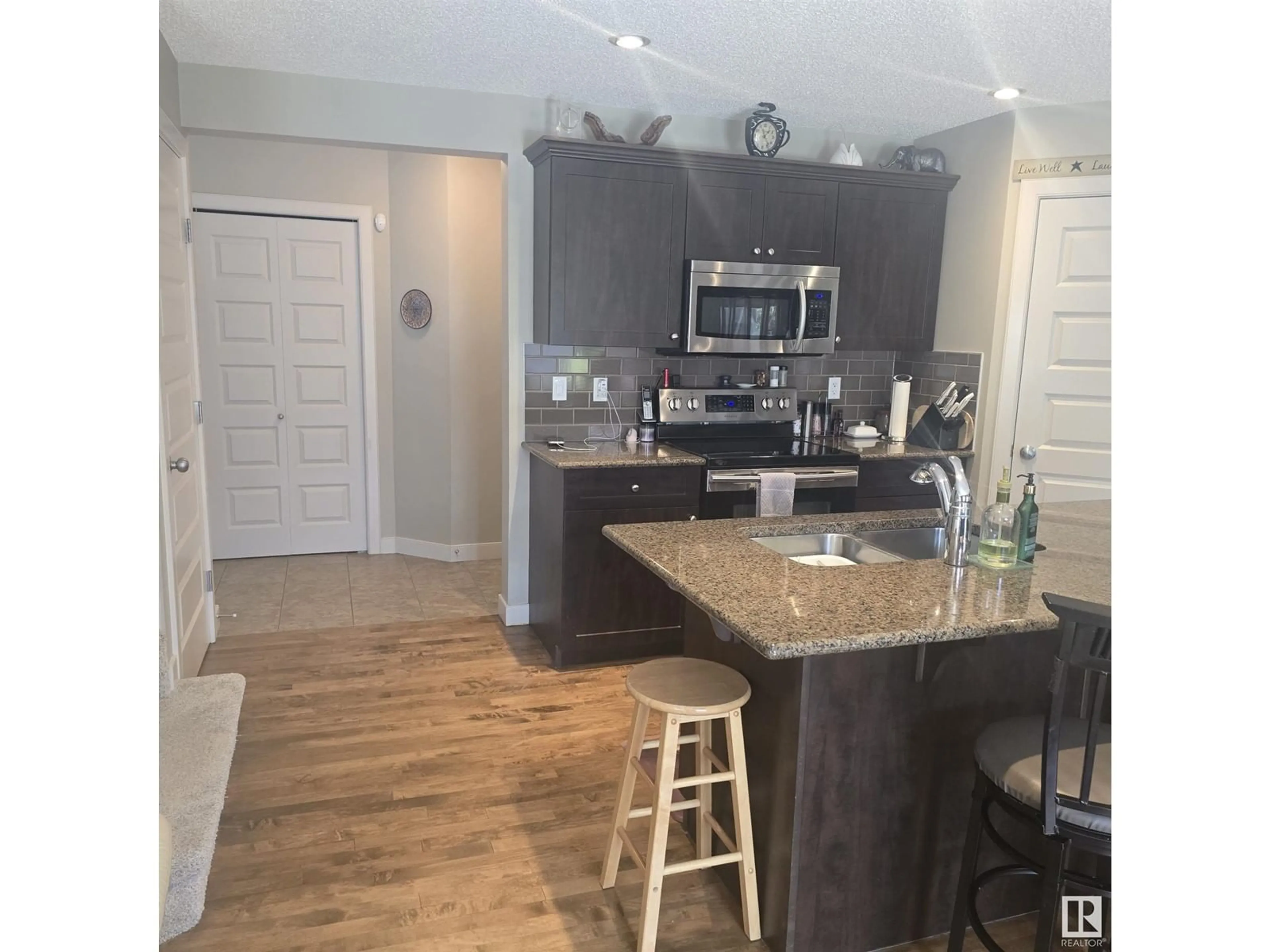 Open concept kitchen, unknown for 1707 CUNNINGHAM WY, Edmonton Alberta T6W0W4