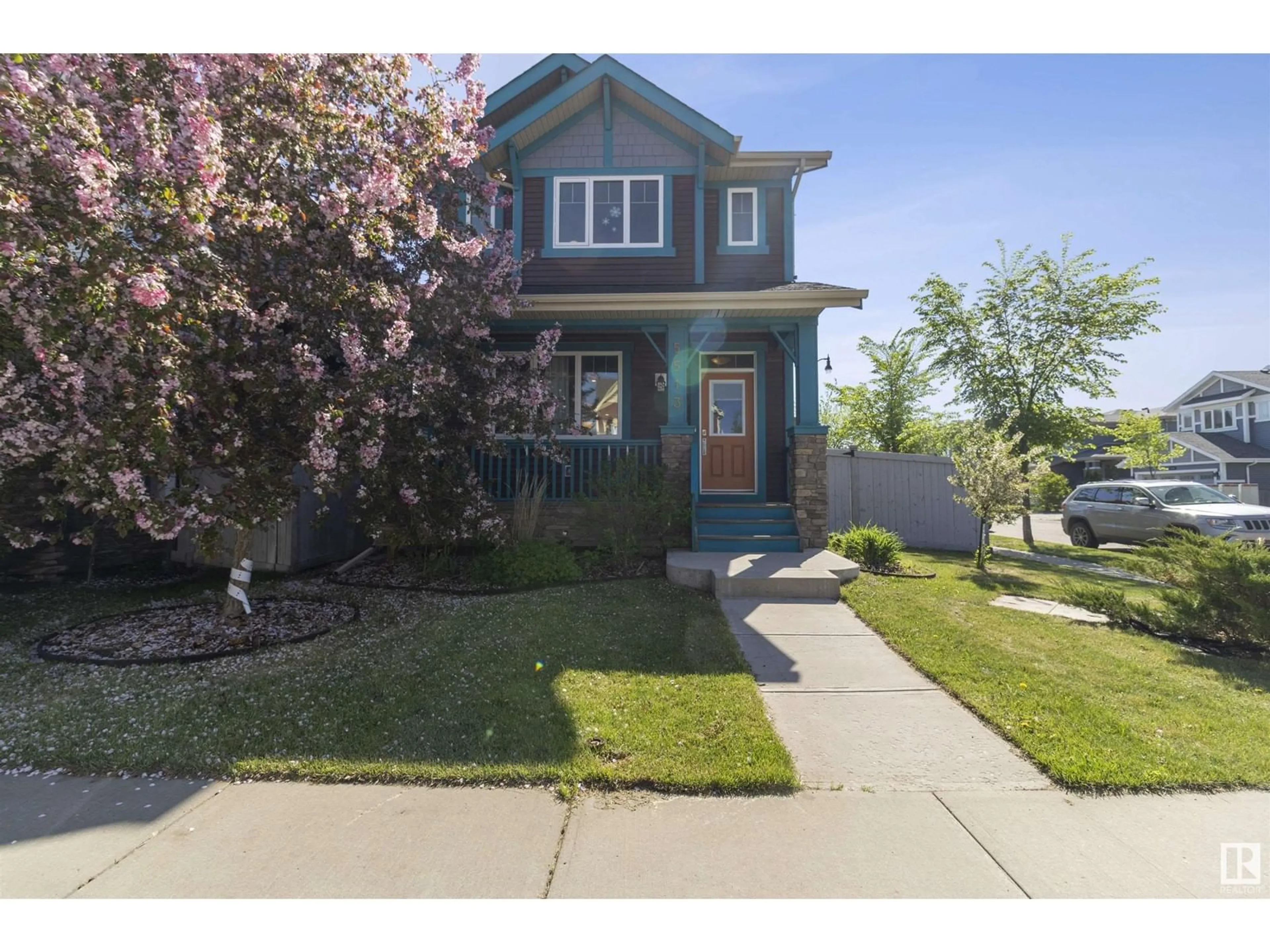Home with vinyl exterior material, street for 5513 CONESTOGA ST, Edmonton Alberta T5E6R9