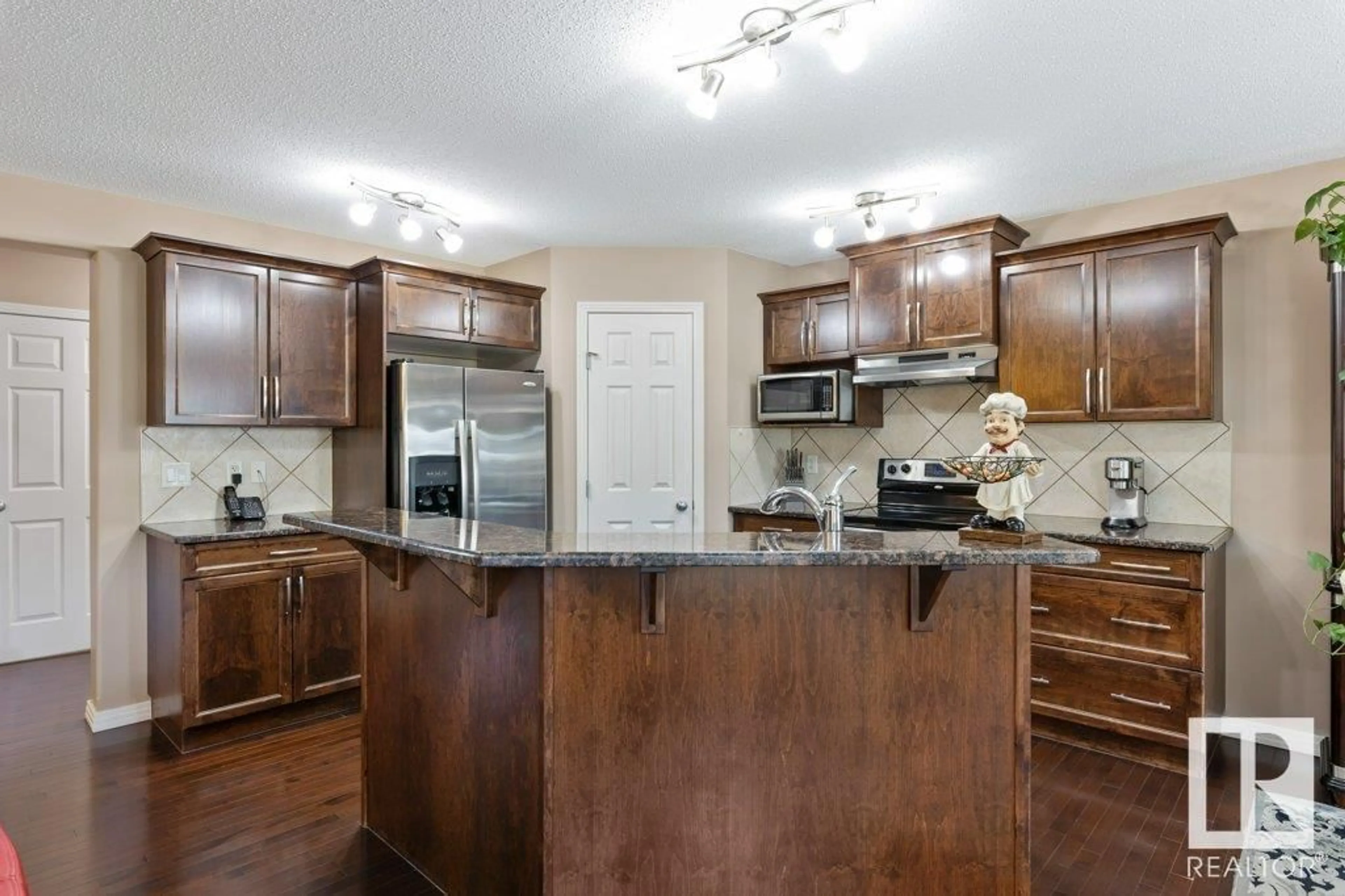 Open concept kitchen, unknown for NW - 16023 138 ST, Edmonton Alberta T6V0E2