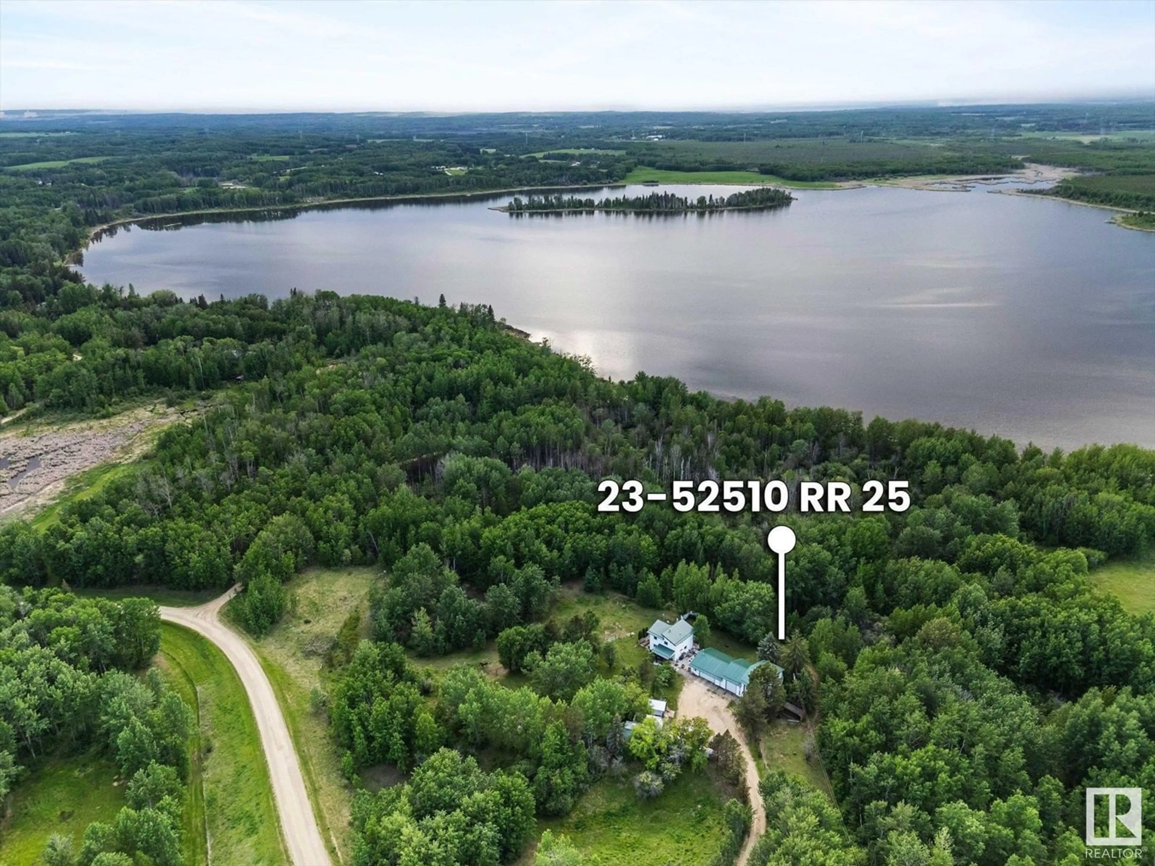 A pic from outside/outdoor area/front of a property/back of a property/a pic from drone, water/lake/river/ocean view for 52510 - 23 RGE ROAD 25, Rural Parkland County Alberta T0E0H0