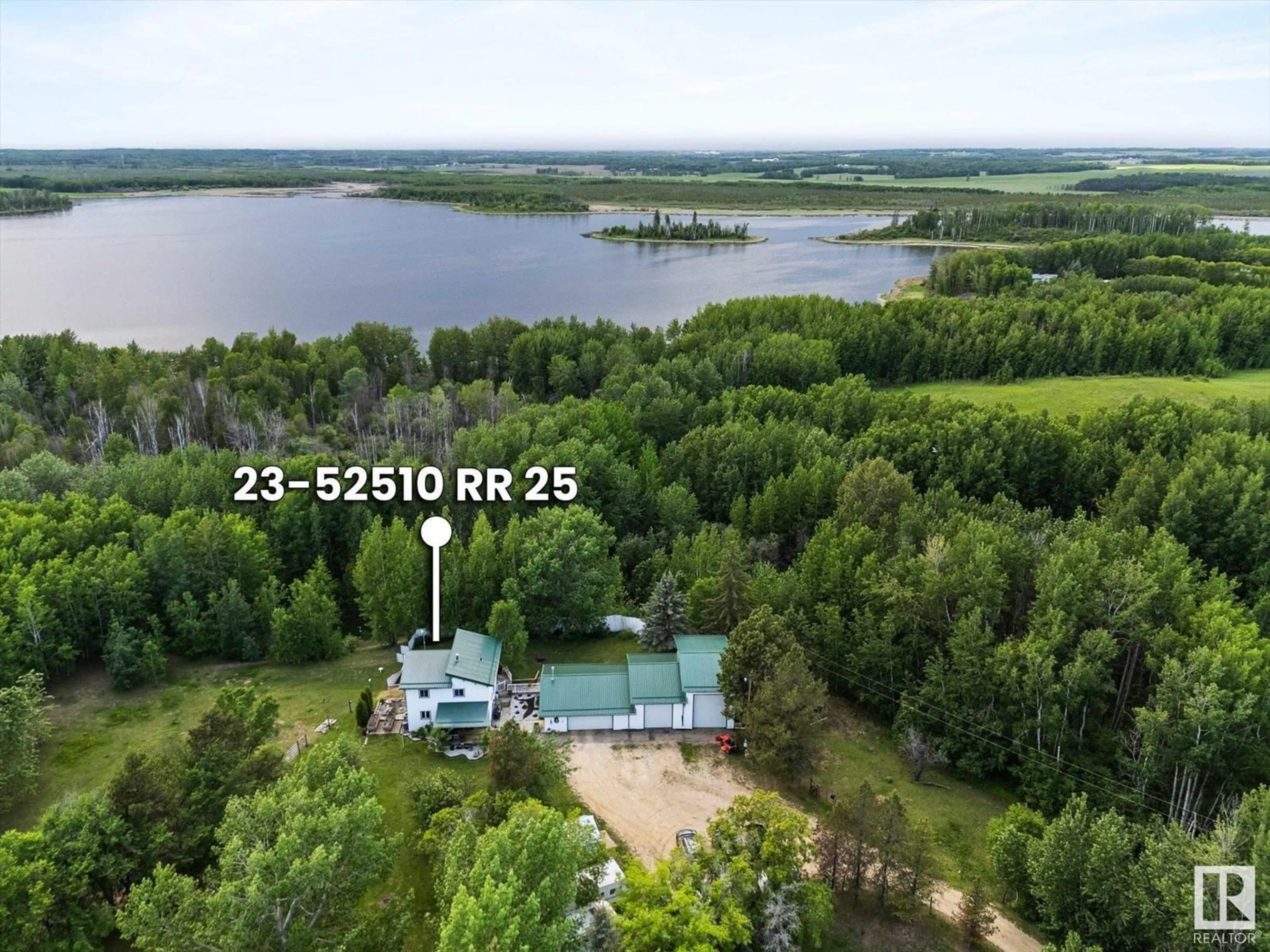 A pic from outside/outdoor area/front of a property/back of a property/a pic from drone, water/lake/river/ocean view for 52510 - 23 RGE ROAD 25, Rural Parkland County Alberta T0E0H0