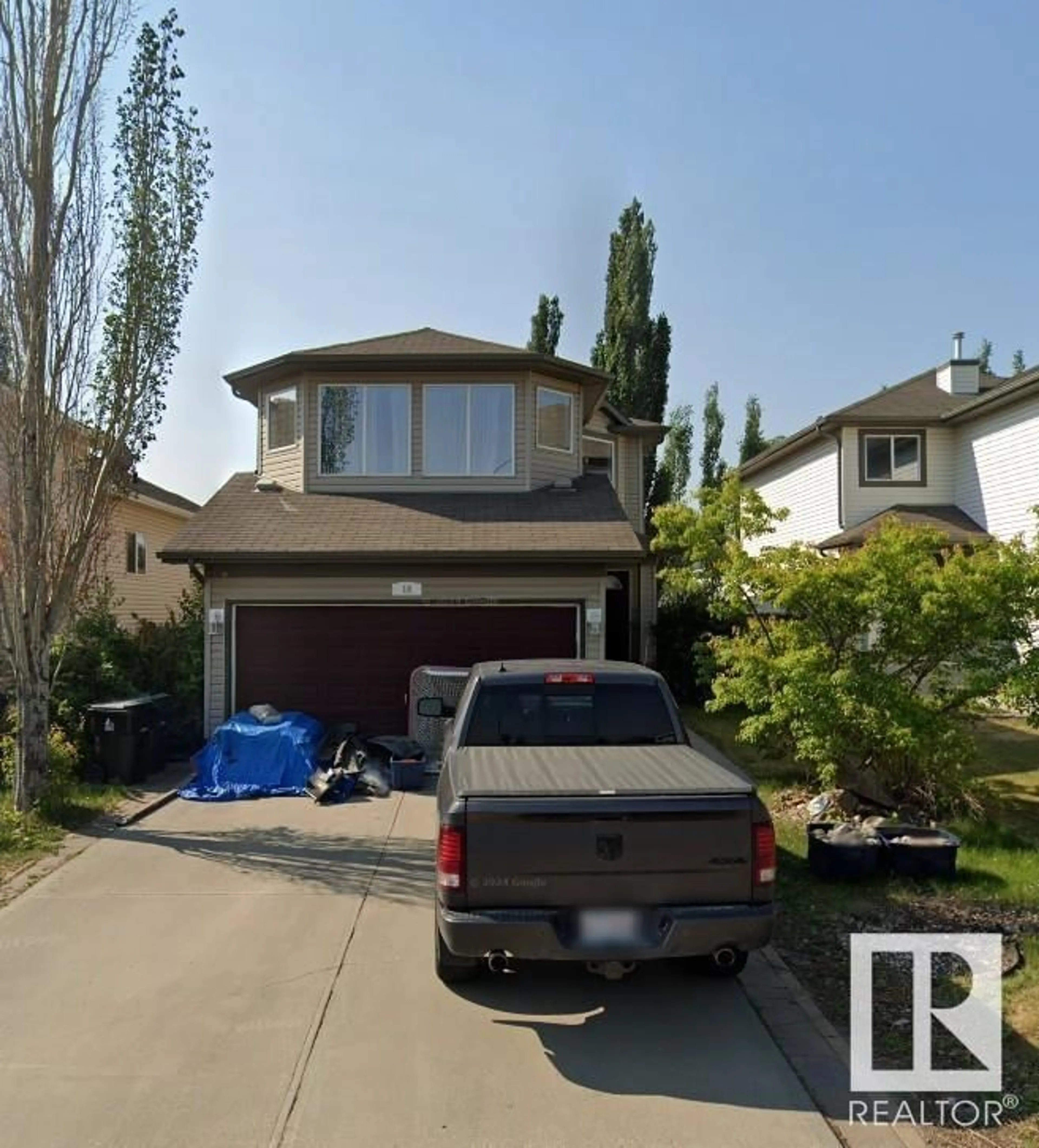 Home with vinyl exterior material, street for 18 GREYSTONE CR, Spruce Grove Alberta T7X0A7