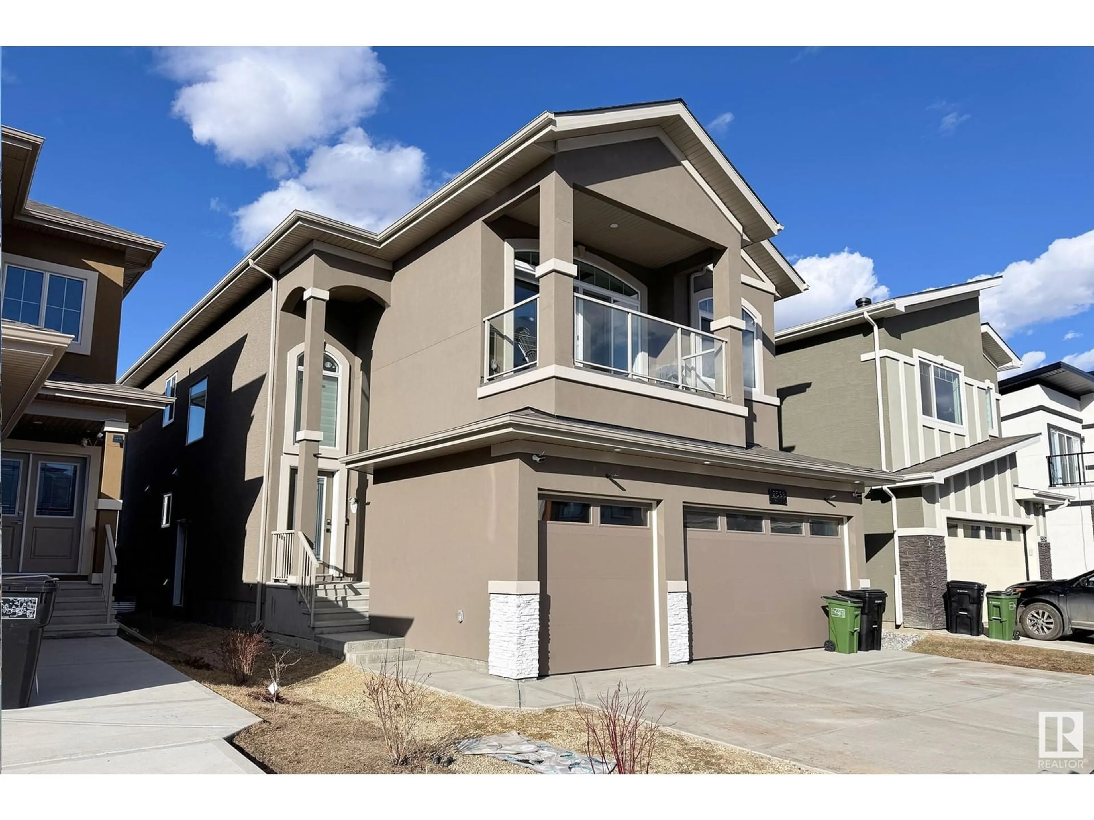 Home with vinyl exterior material, street for 2538 14A NW, Edmonton Alberta T6T2T6