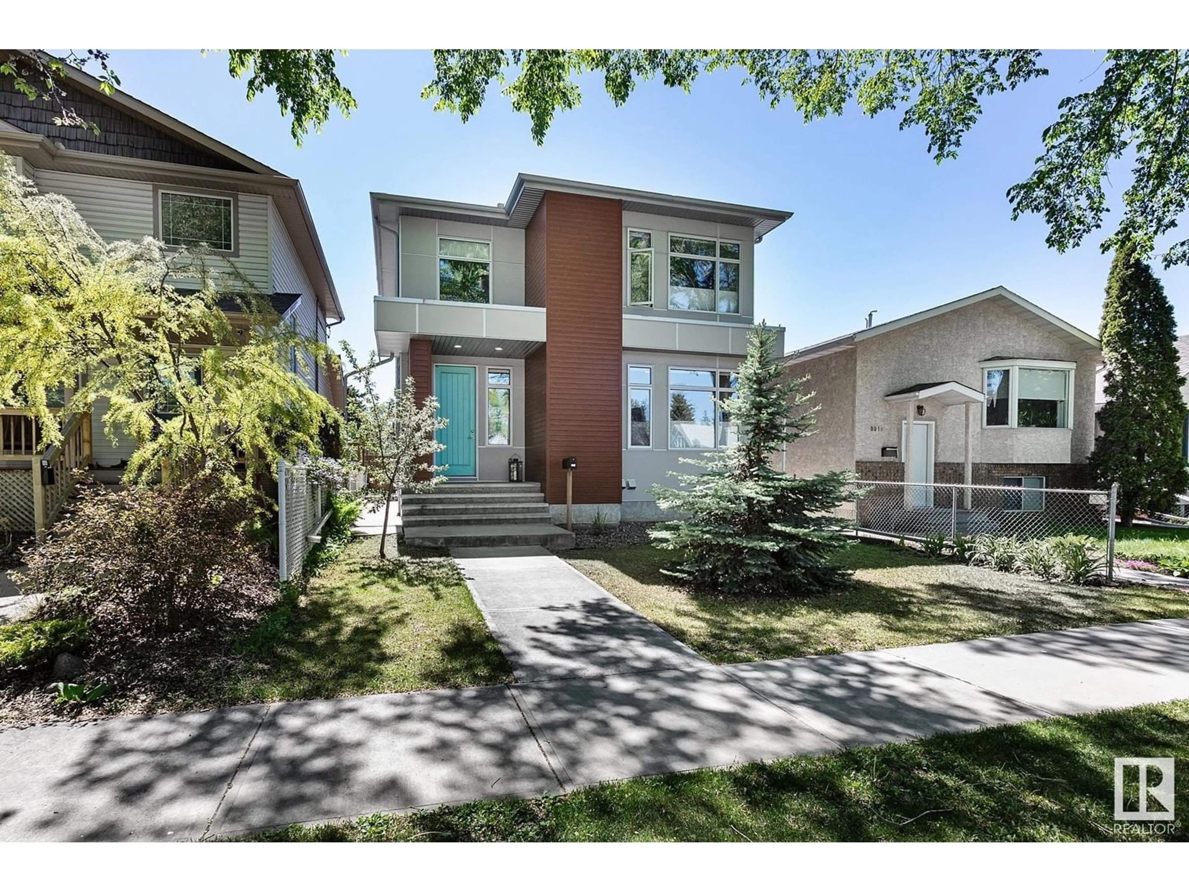 Home with vinyl exterior material, street for 8915 80 AV, Edmonton Alberta T6C0T6