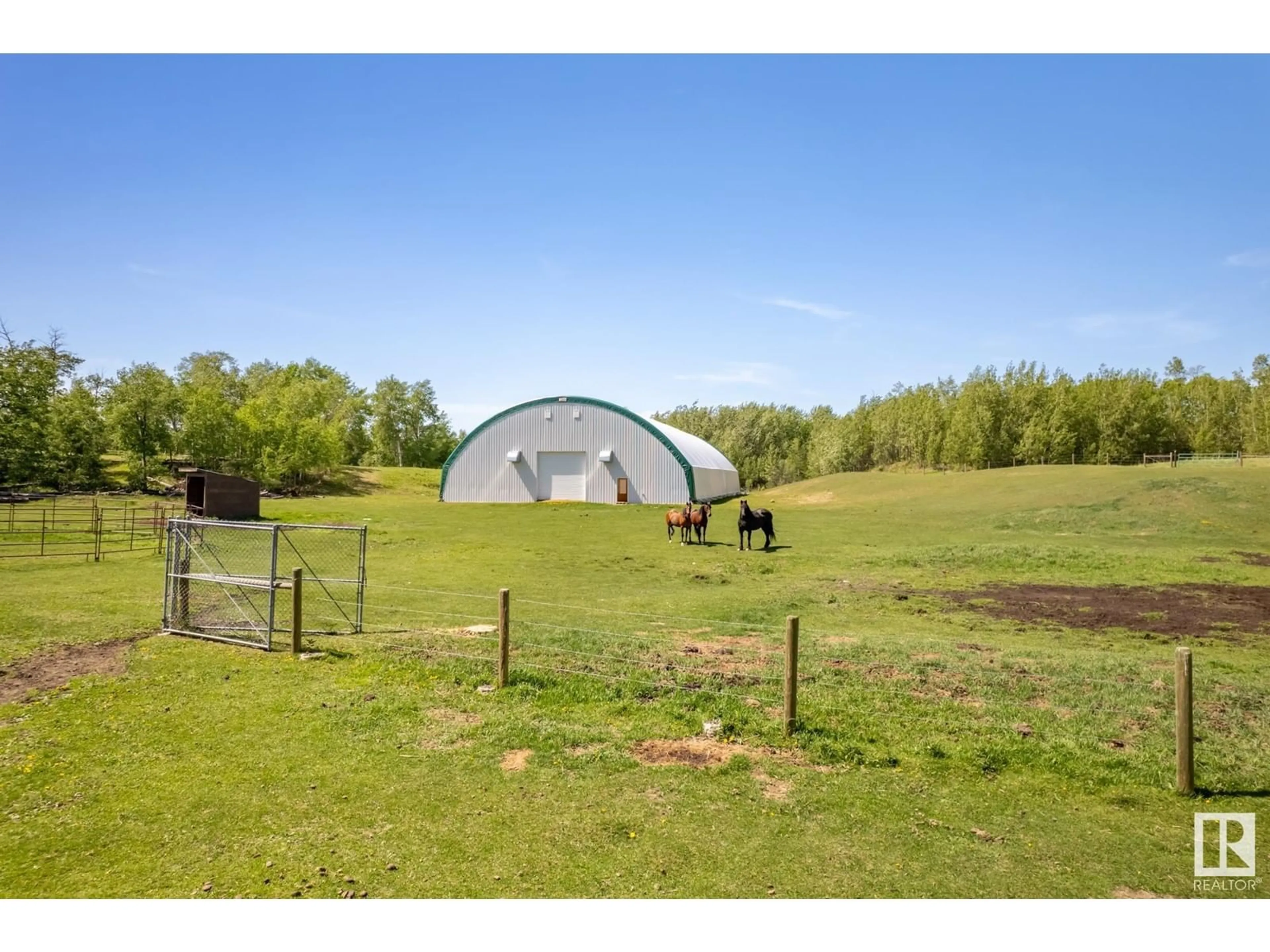 A pic from outside/outdoor area/front of a property/back of a property/a pic from drone, unknown for 51030 RGE ROAD 203, Rural Strathcona County Alberta T8G1E4