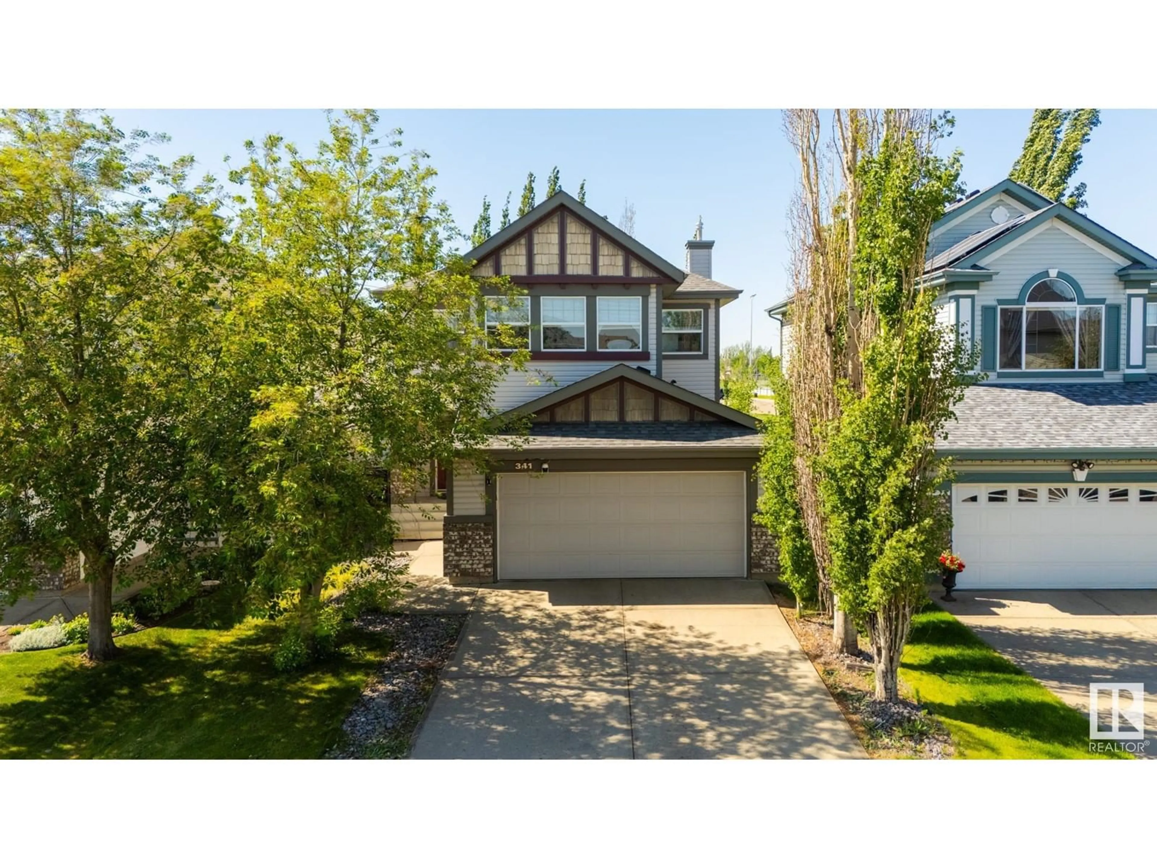 Home with vinyl exterior material, street for 341 CALDERON CR, Edmonton Alberta T6V1R4