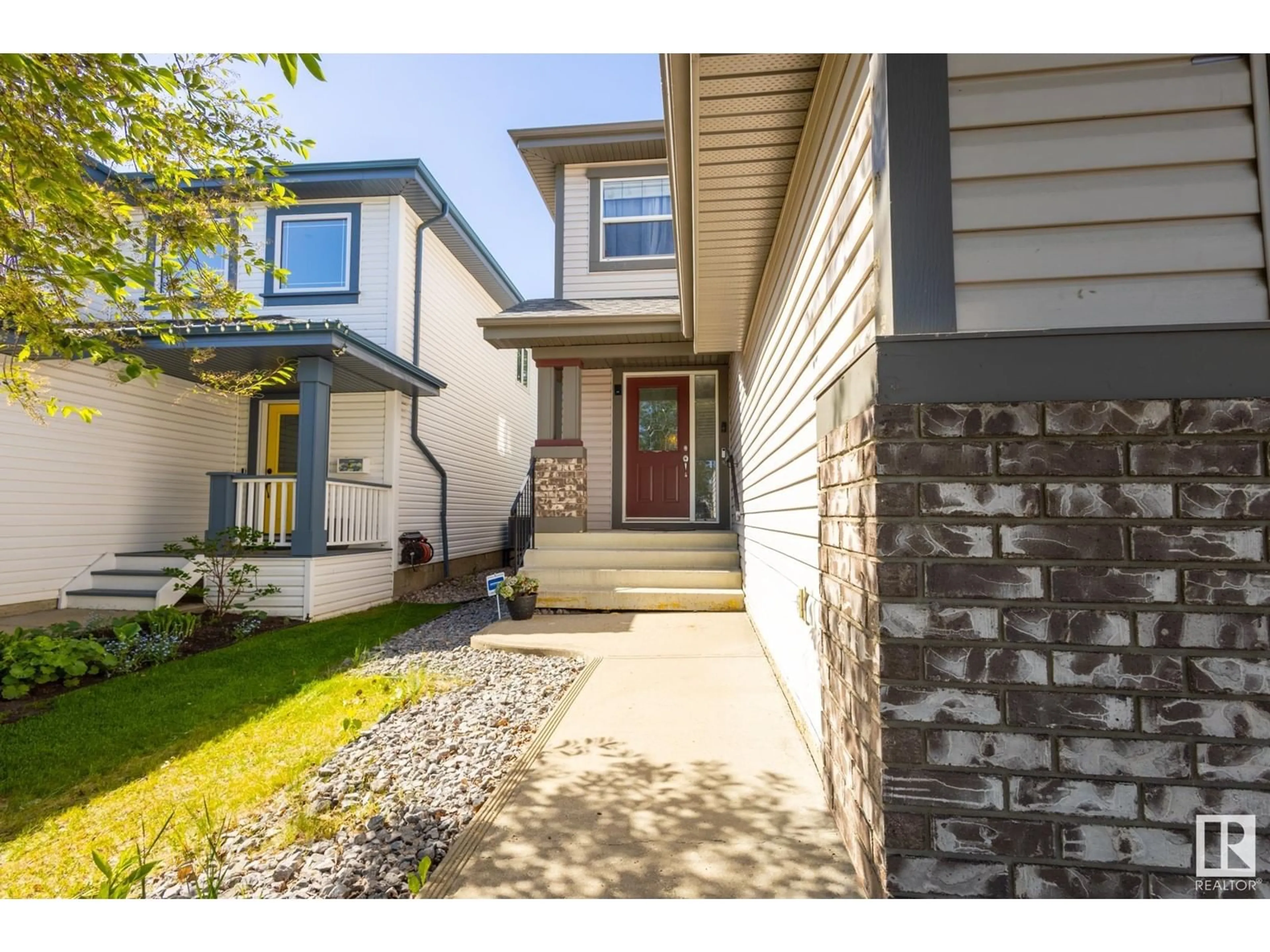 Home with vinyl exterior material, street for 341 CALDERON CR, Edmonton Alberta T6V1R4