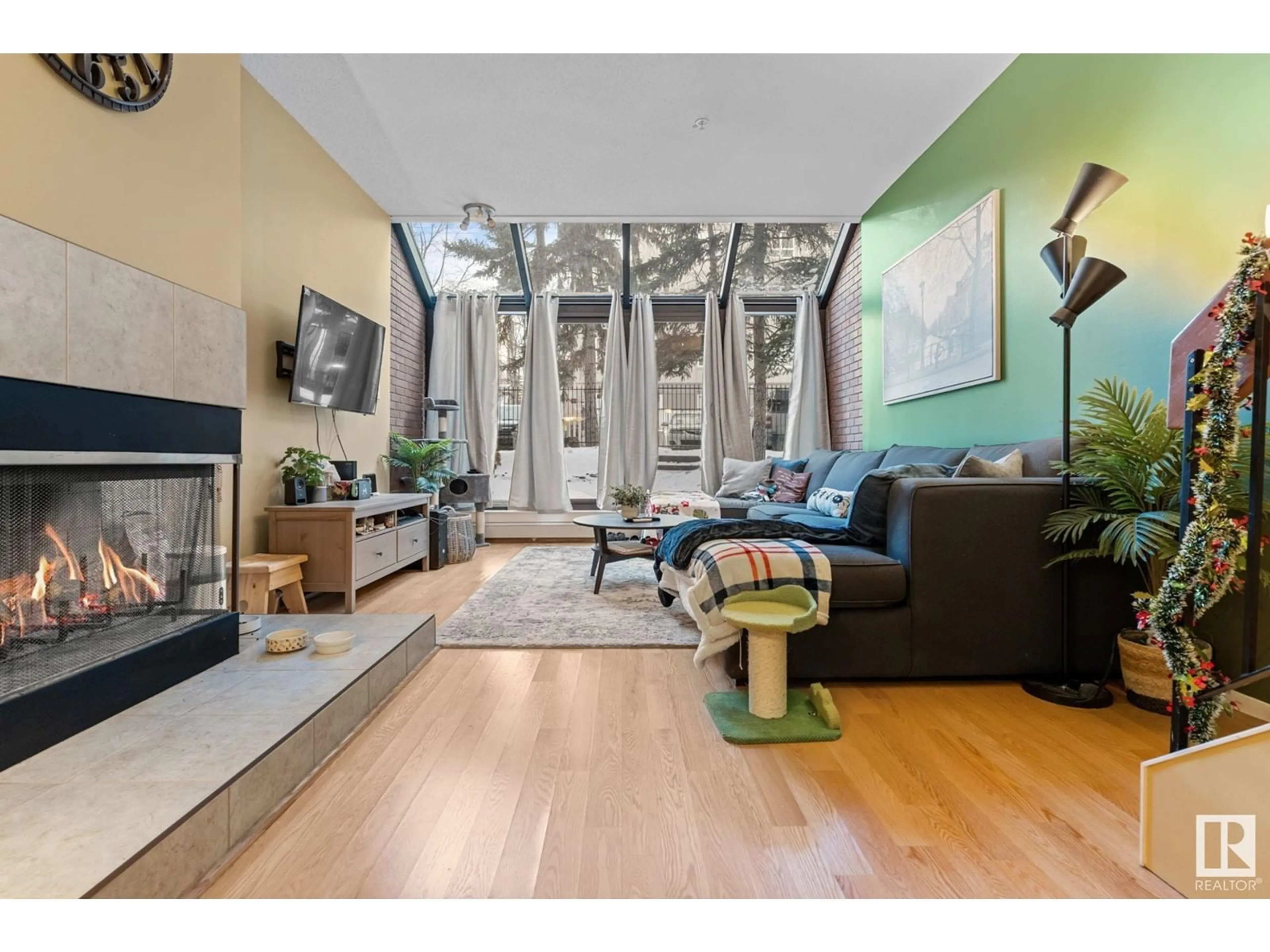 Living room with furniture, unknown for 11166 83 AV, Edmonton Alberta T6G0V1