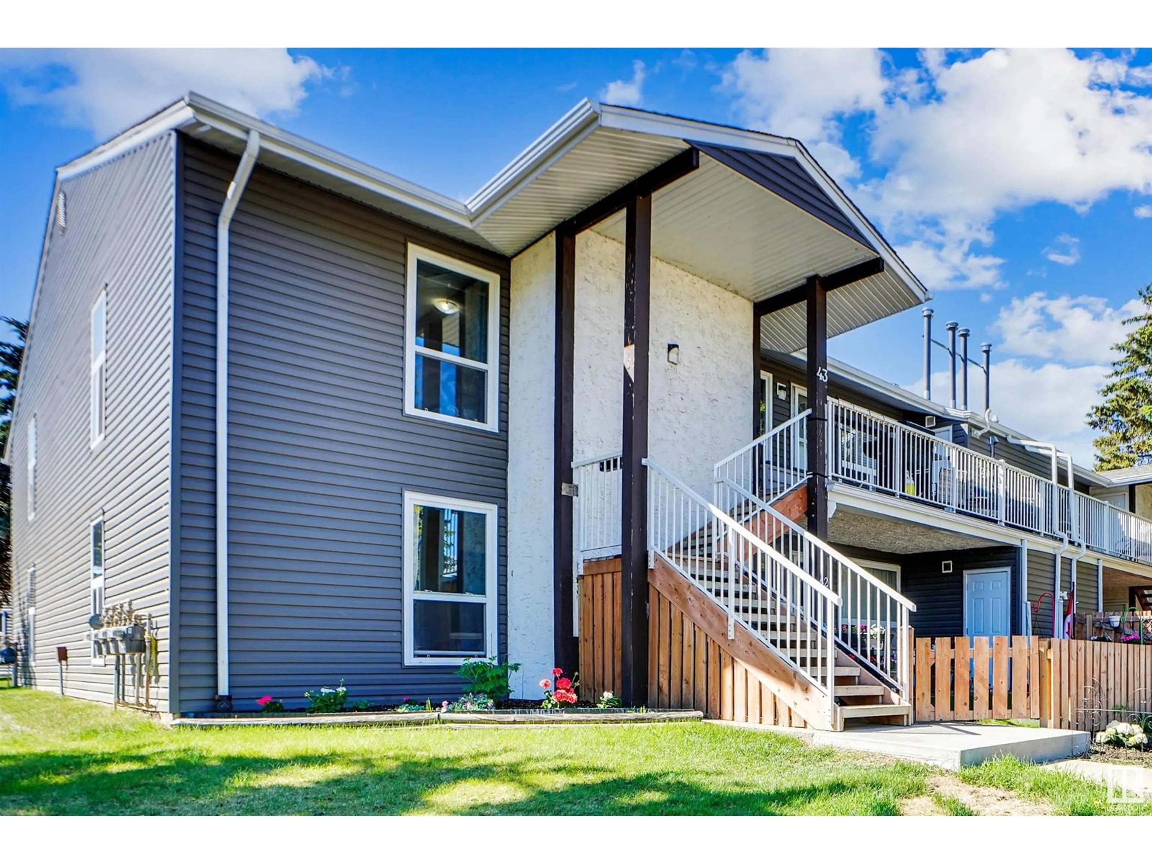 Home with vinyl exterior material, street for 43 - 3111 142 AV NW, Edmonton Alberta T5Y2H6
