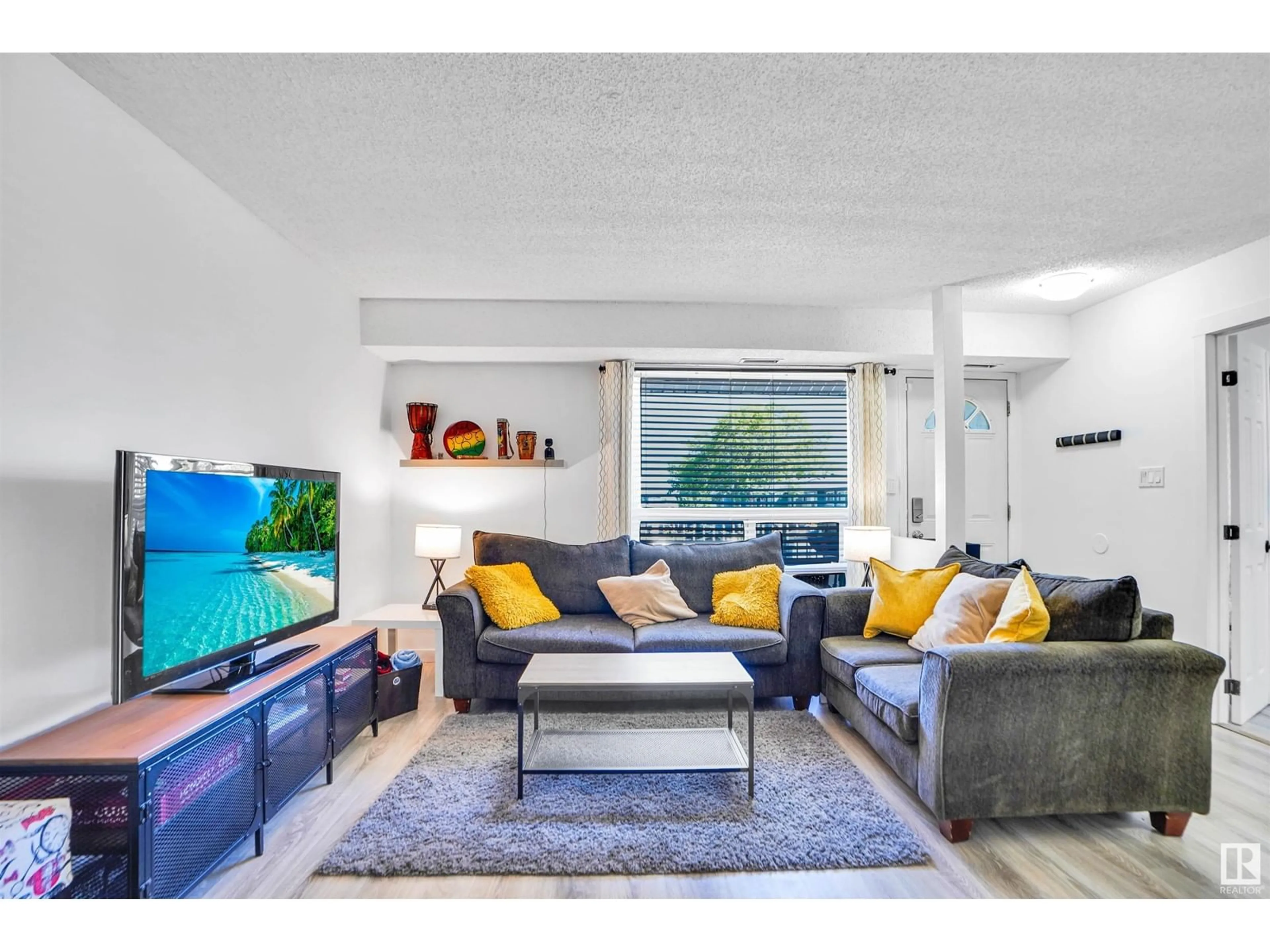 Living room with furniture, unknown for 43 - 3111 142 AV NW, Edmonton Alberta T5Y2H6