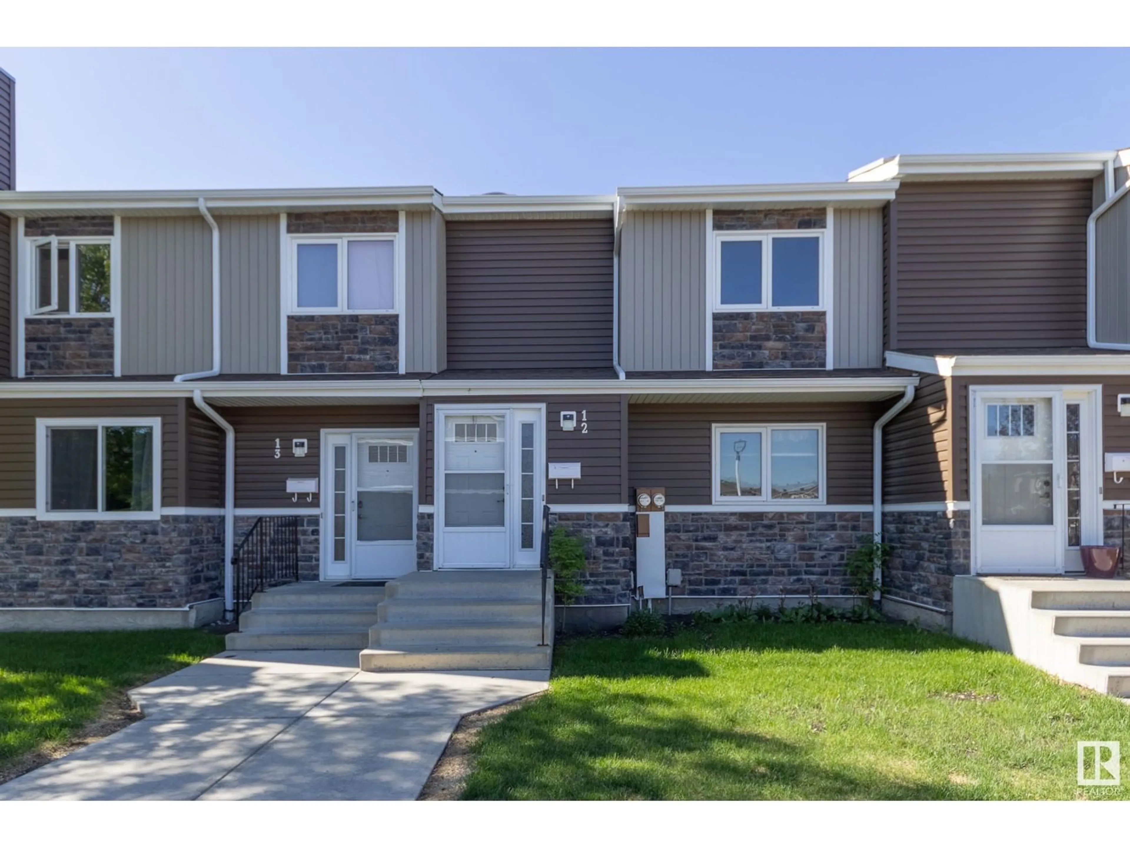 Home with vinyl exterior material, street for #12 - 3115 119 ST, Edmonton Alberta T6J5N5