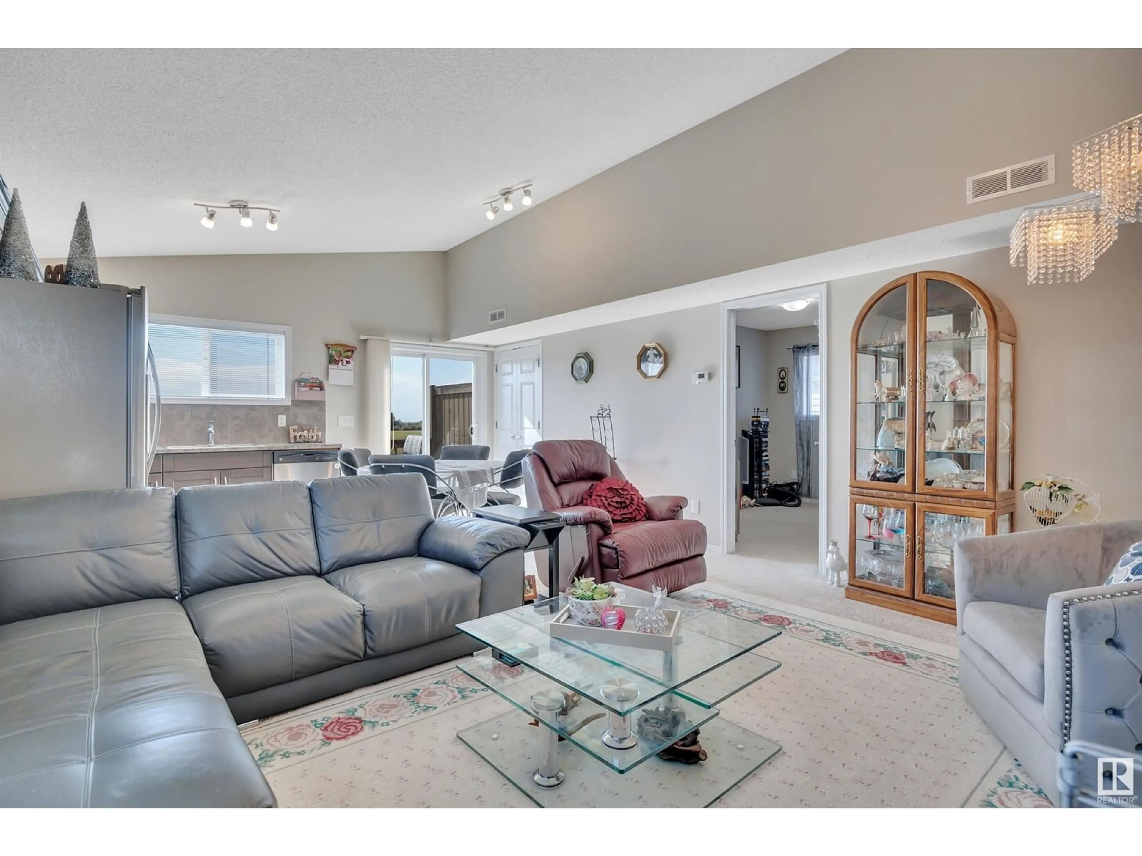 Living room with furniture, unknown for #167/168 - 142 SELKIRK PL, Leduc Alberta T9E0M9