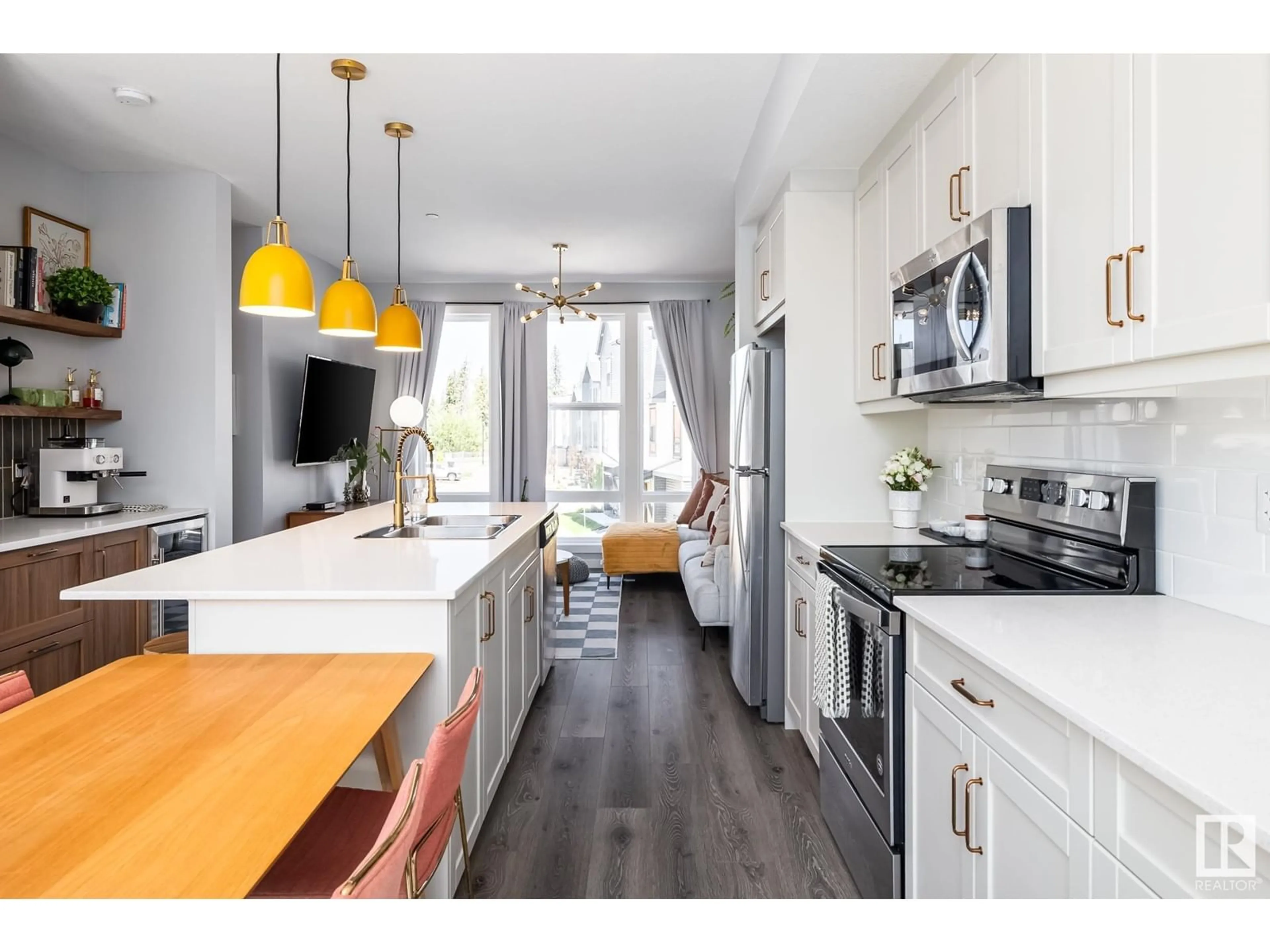 Open concept kitchen, wood/laminate floor for #122 - 1304 RUTHERFORD RD, Edmonton Alberta T6W0B4