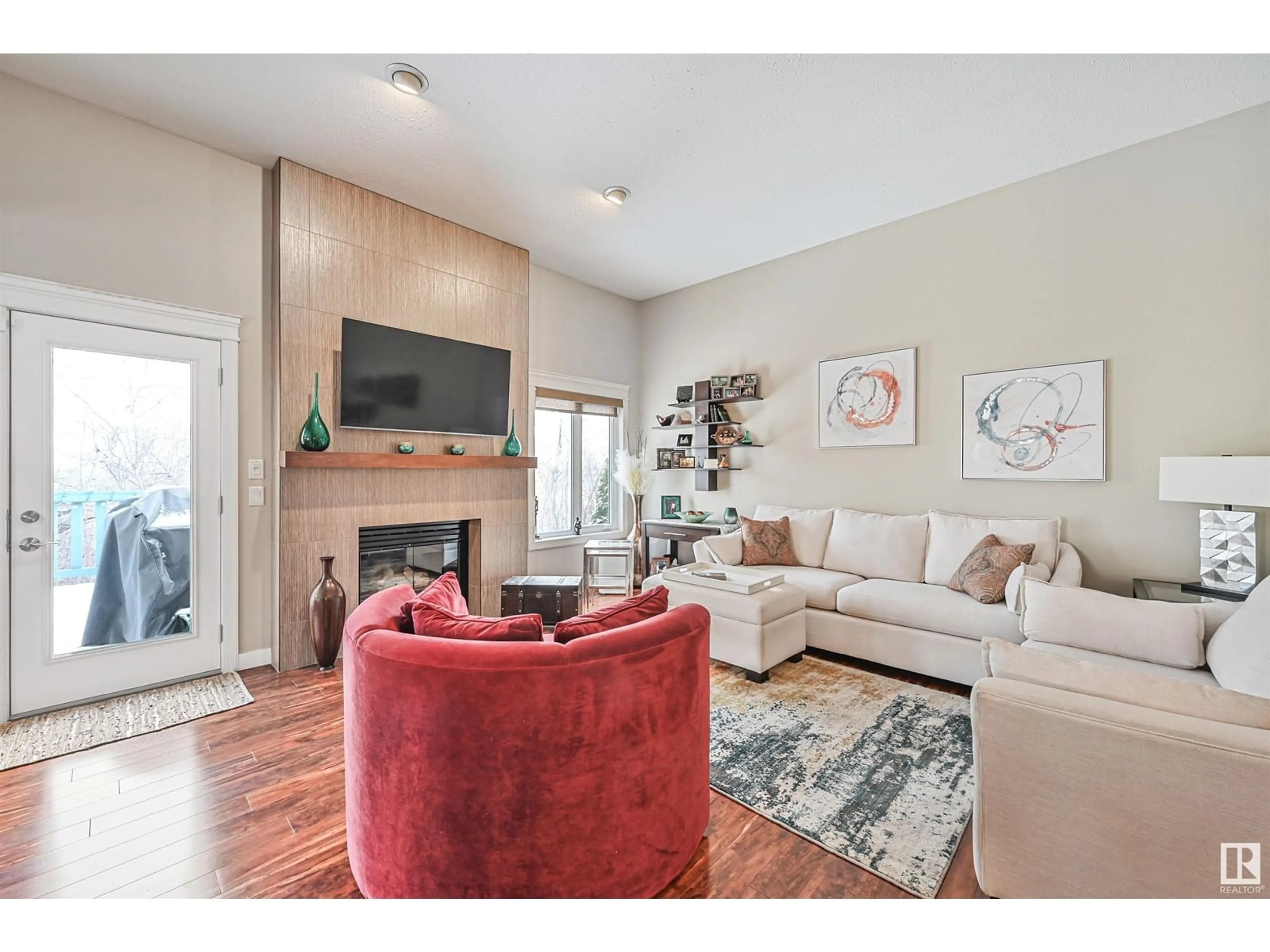 Living room with furniture, wood/laminate floor for #21 - 1130 FALCONER RD, Edmonton Alberta T6R2J6
